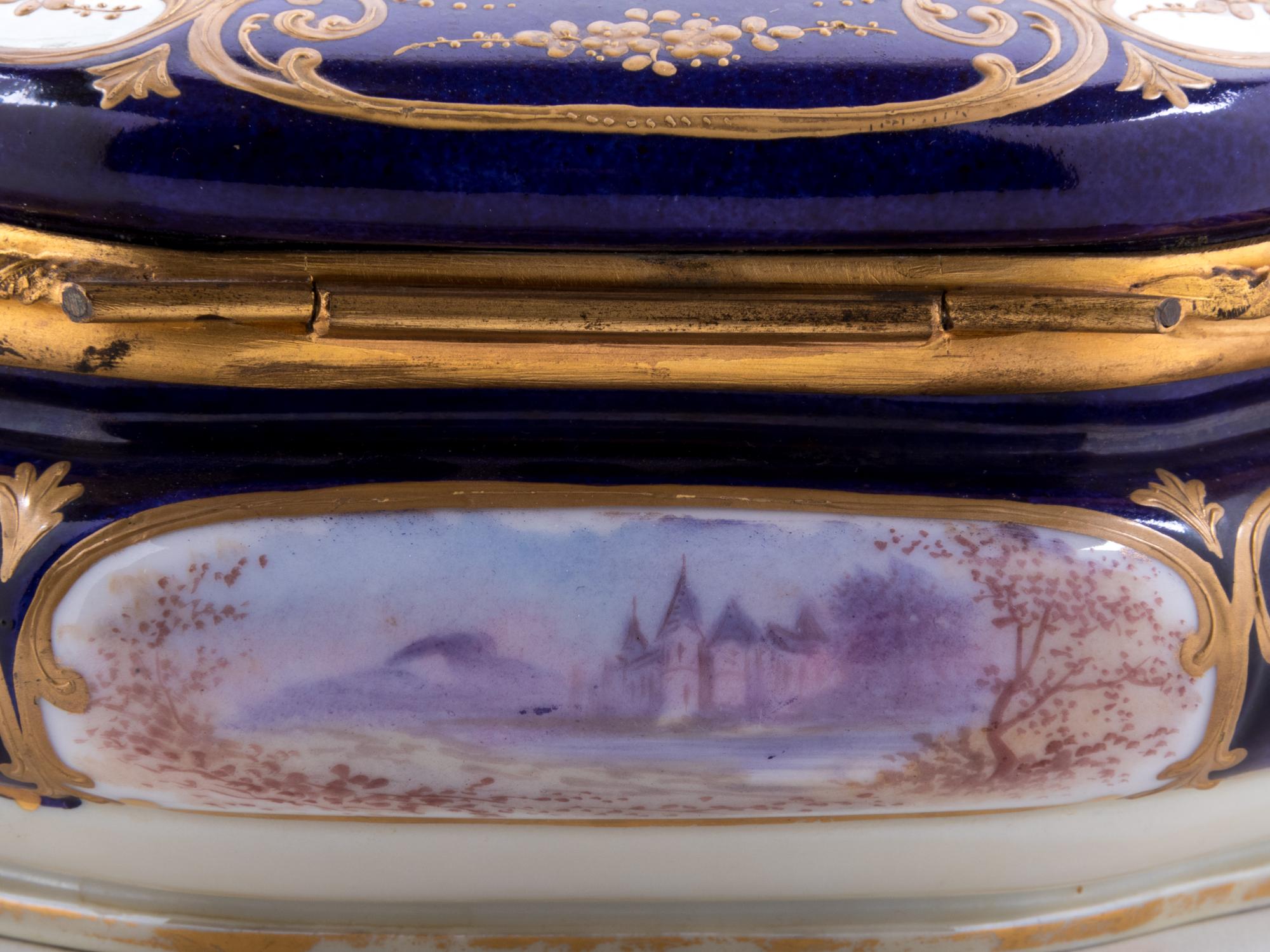 A Sèvres Style Painted and Parcel Gilt Porcelain Table Casket