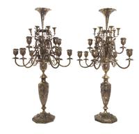A Pair of Persian Silver Eighteen-Light Candelabra, Iran, Probably Mid-20th Century, each topped with a trumpet vase centering foliate