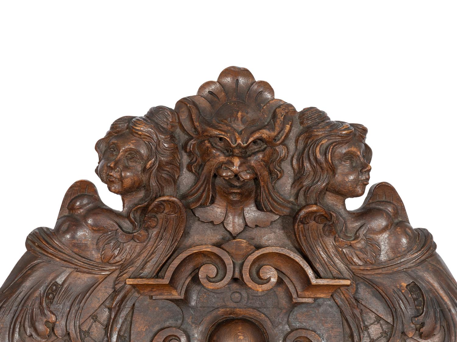 An Italian Renaissance Revival Carved Walnut Savonarola Chair