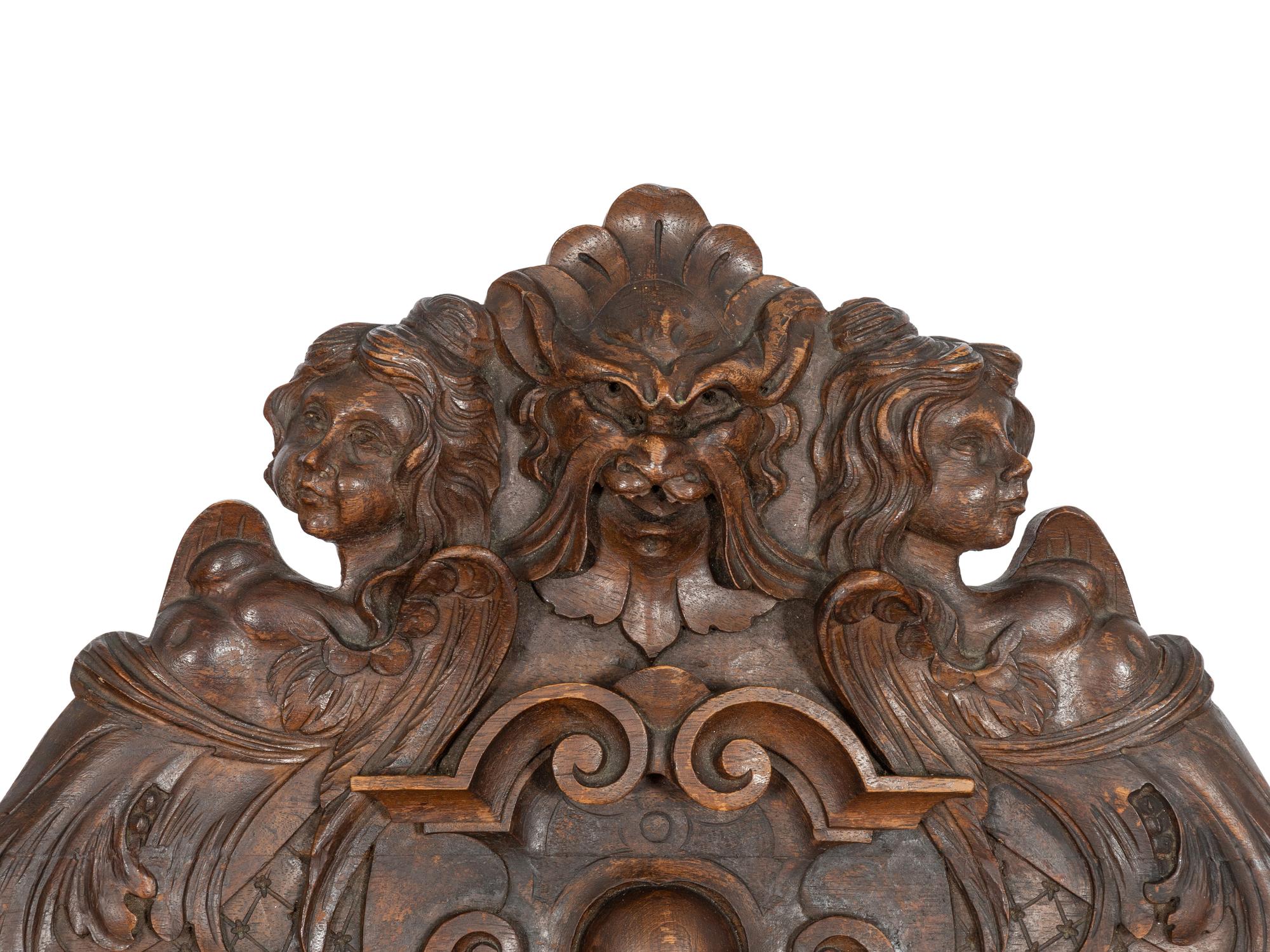 An Italian Renaissance Revival Carved Walnut Savonarola Chair