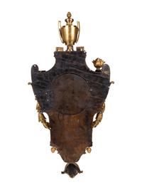 A Louis XVI Gilt Bronze Cartel Clock