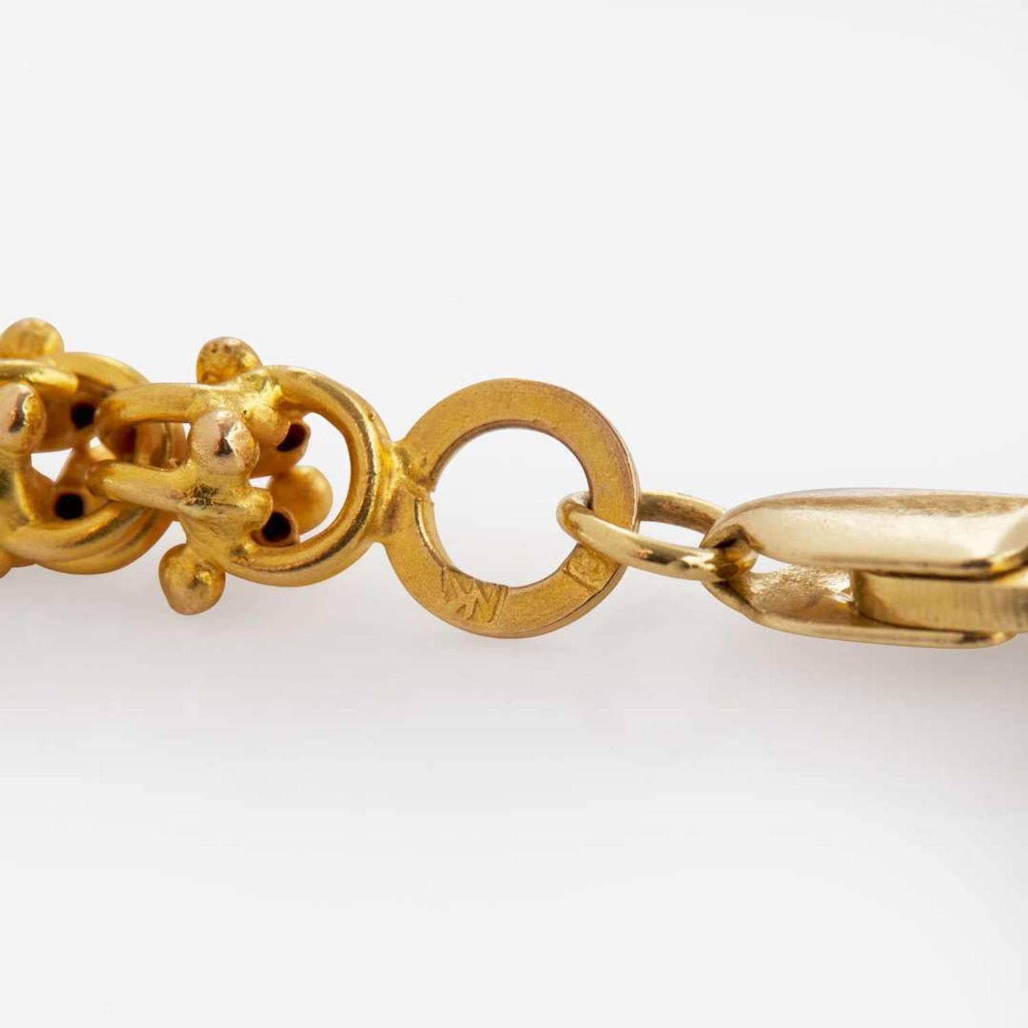 An 18K Yellow Gold Long Chain Necklace