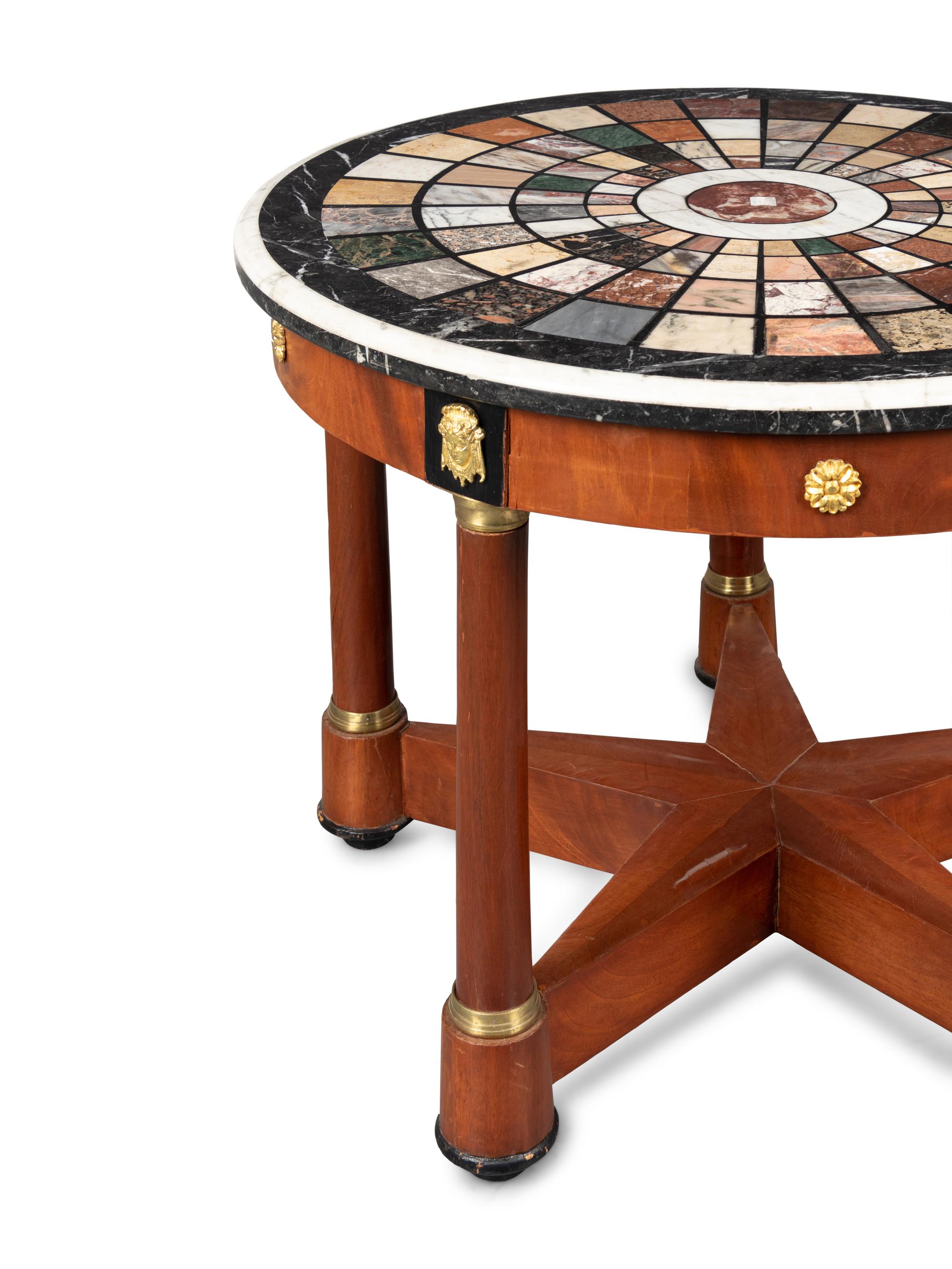 An Empire Style Brass Mounted Mahogany Center Table with a Specimen Marble Top