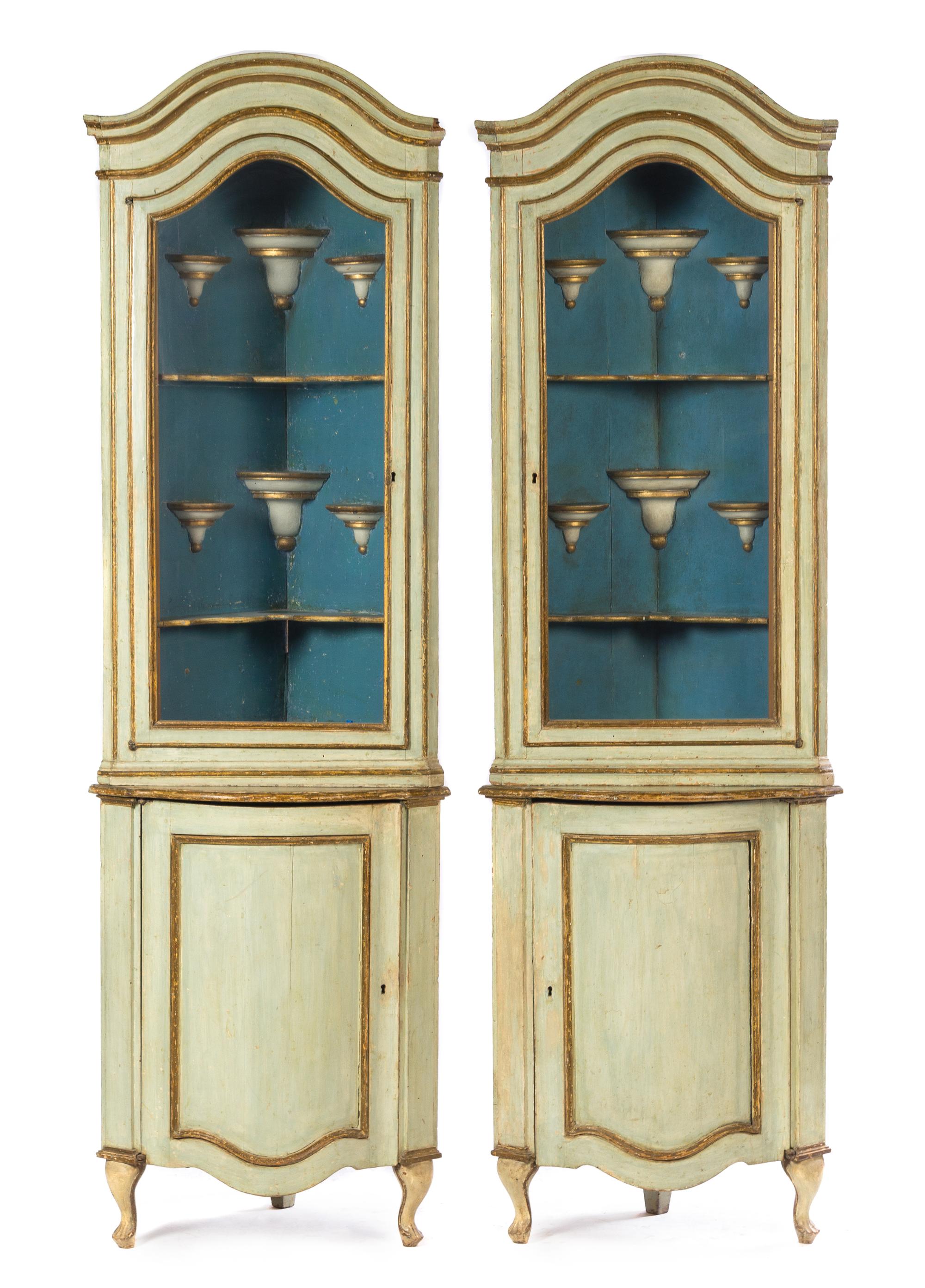 A Pair of Italian Painted Corner Cabinets Height 81 1/2 x width 23 1/2 x depth 18 1/2 inches. — LATE 18TH/EARLY 19TH CENTURY