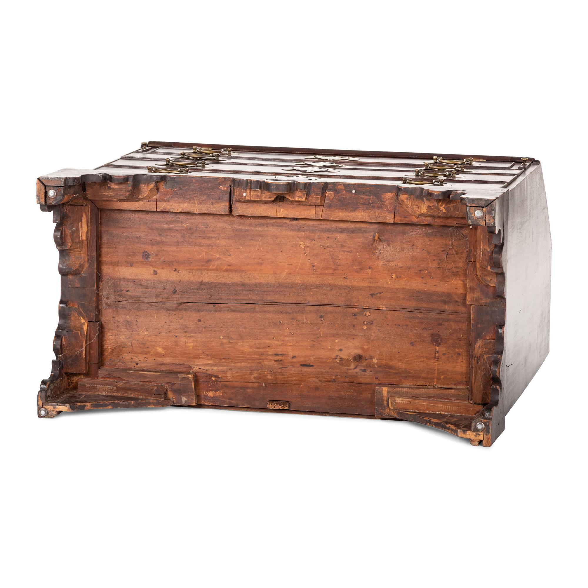 A Chippendale Carved and Figured Mahogany Slant-Front Desk