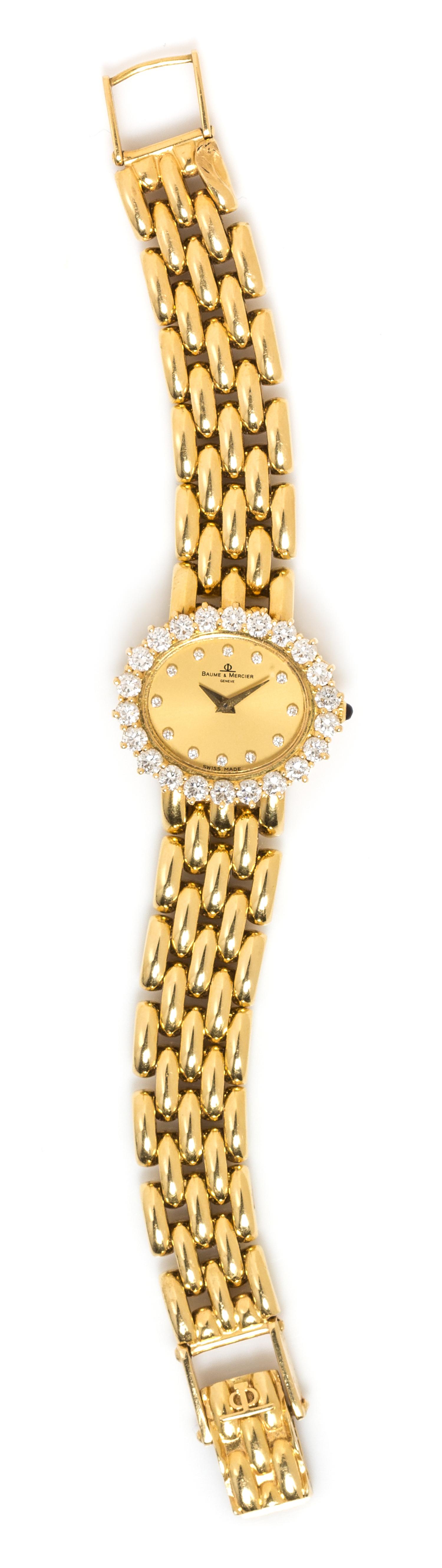 An 18 Karat Yellow Gold and Diamond Wristwatch, Baume & Mercier, 32.30 dwts.