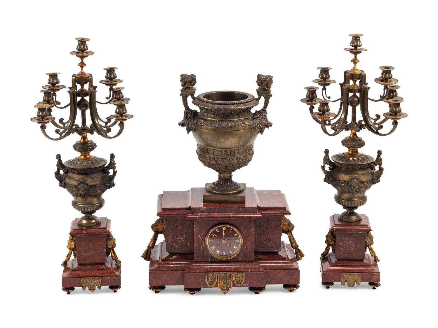 A Monumental French Neoclassical Gilt Bronze and Rouge Marble Clock Garniture