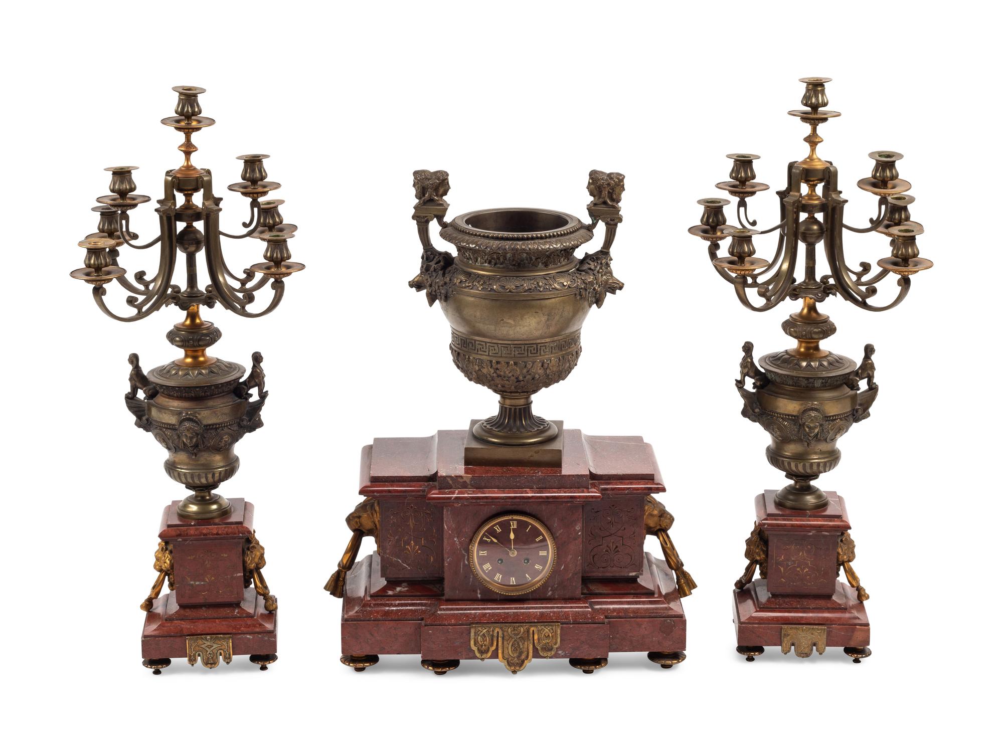 A Monumental French Neoclassical Gilt Bronze and Rouge Marble Clock Garniture