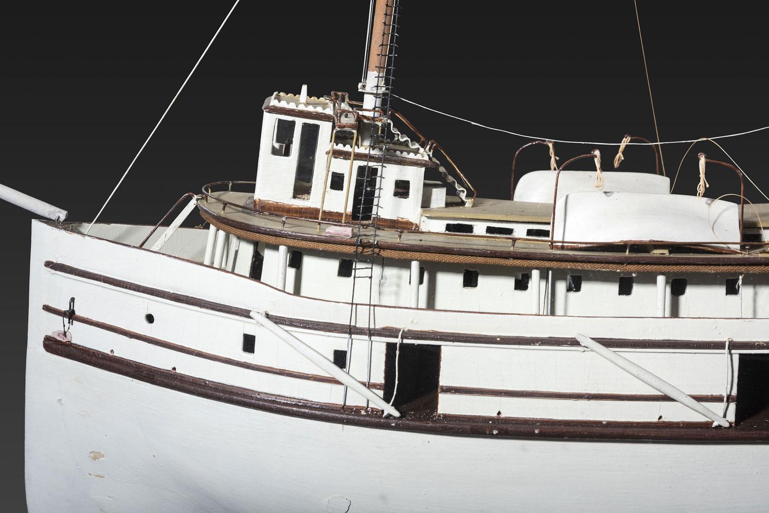 A Painted Wood Cased Steamboat Model