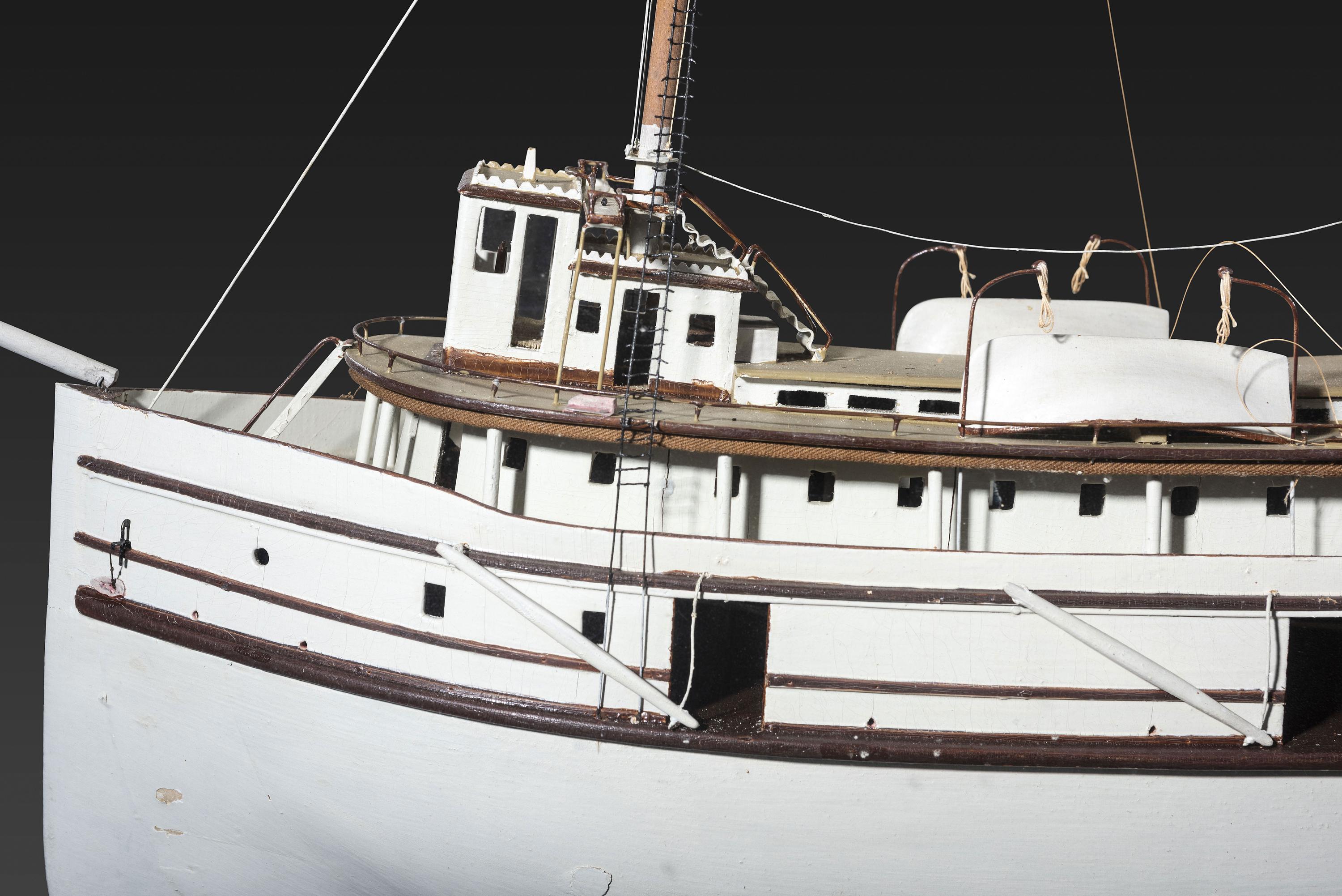 A Painted Wood Cased Steamboat Model