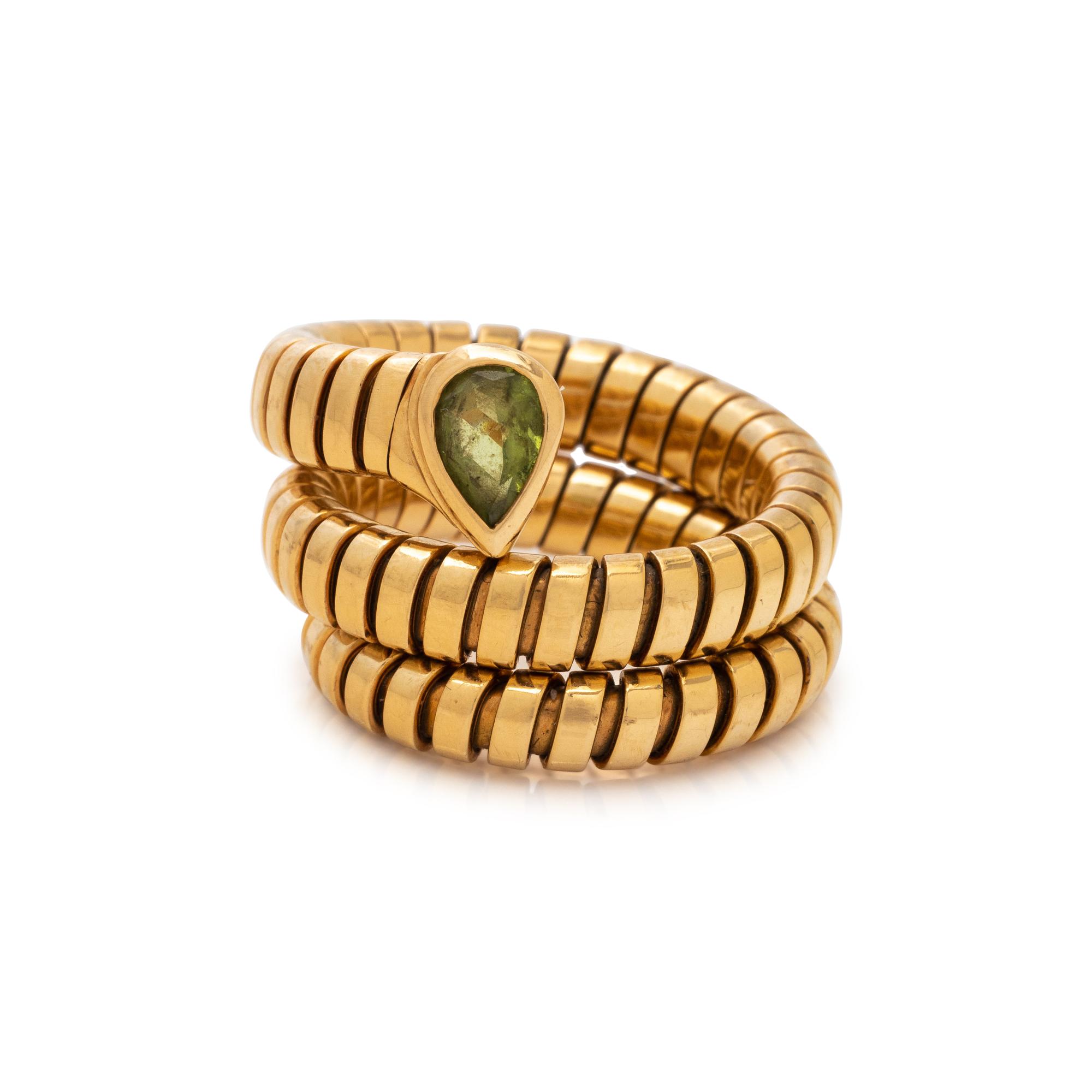 BVLGARI, YELLOW GOLD AND PERIDOT 'SERPENTI' RING