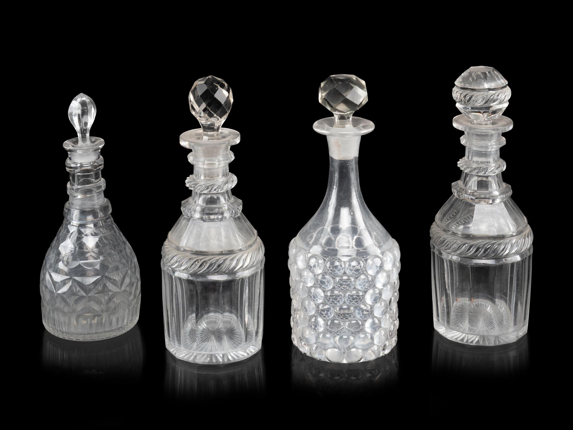 Four Cut-Glass Decanters
