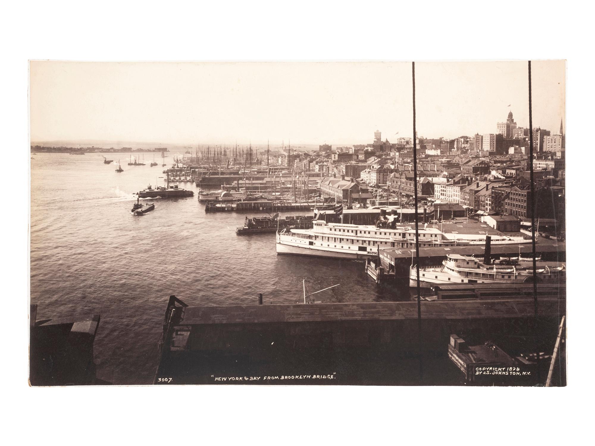 New York -- Brooklyn Bridge JOHNSTON, John S. (1839-1899), photographer. New York & Bay from Brooklyn Bridge . New York: 1894.