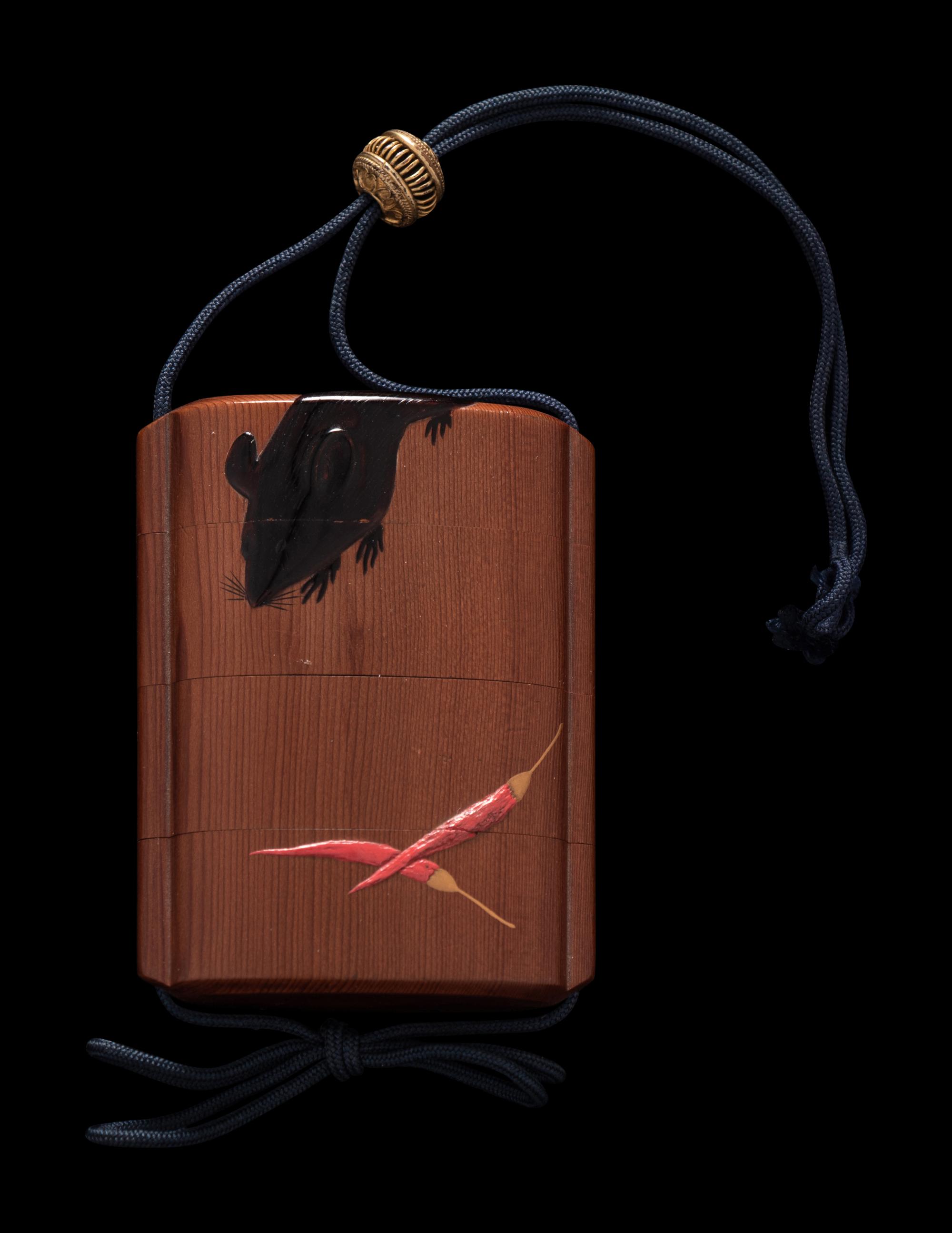 A Japanese Gold, Black and Red Lacquered Cedar Wood Three-Case Inro