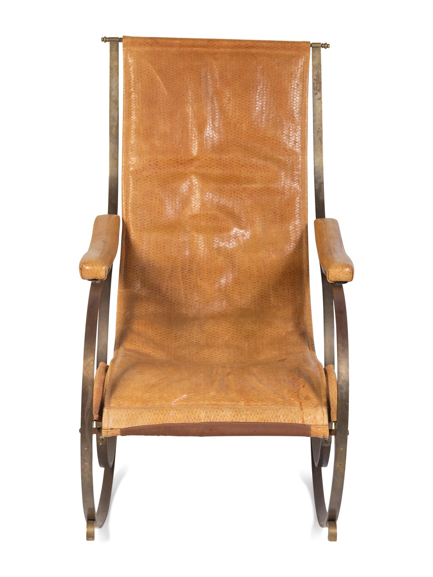 A Forged Iron and Leather Rocking Chair by R. W. Winfield and Co.
