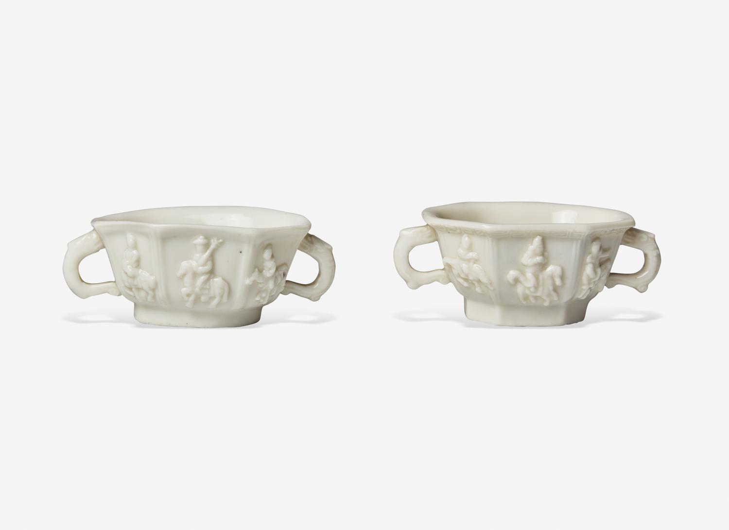 Two Similar Chinese Dehua Porcelain Twin Handled Cups
