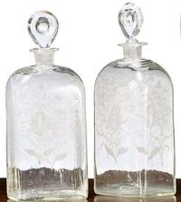 Pair of etched uncolored glass decanters early 19th century