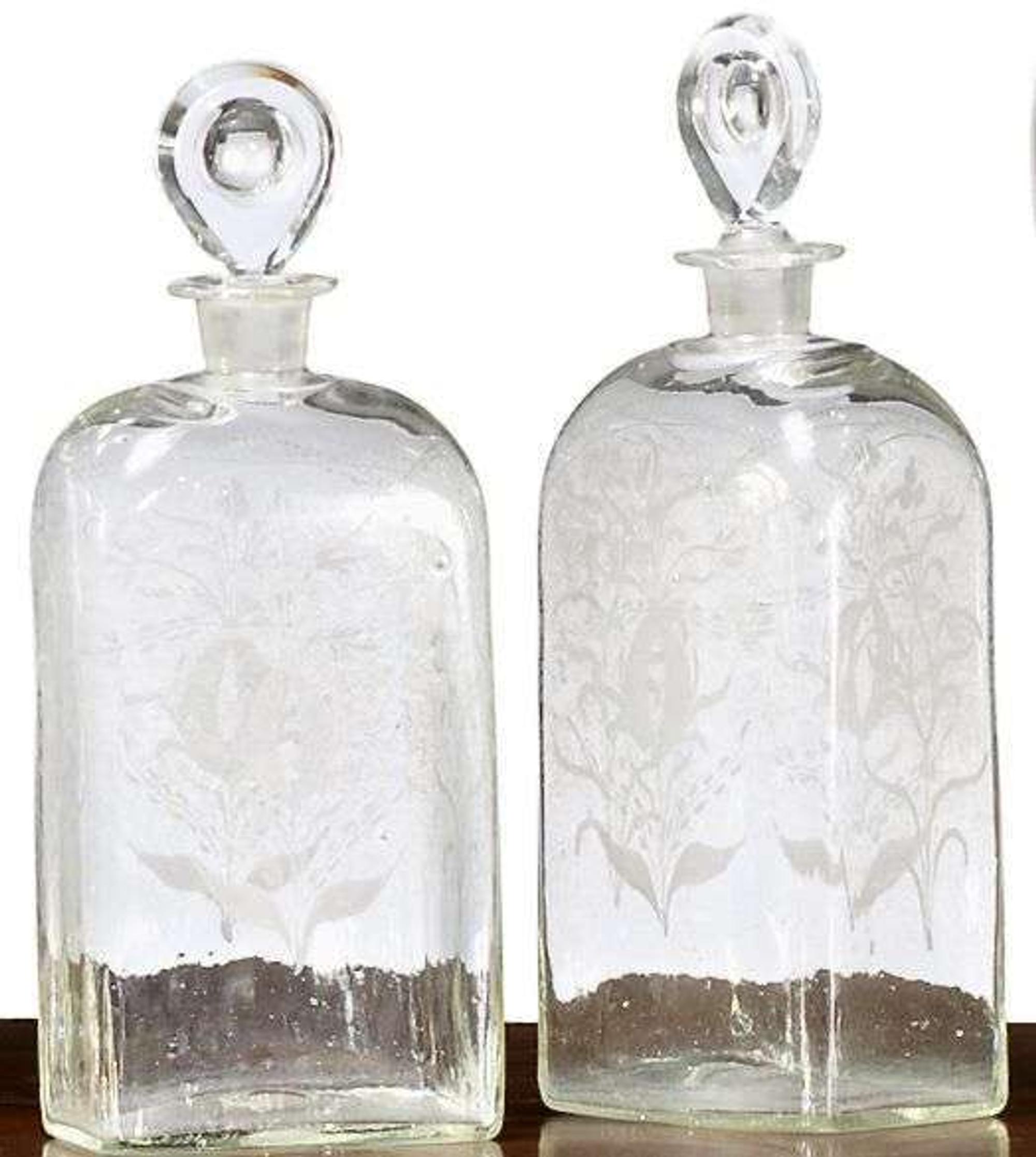 Pair of etched uncolored glass decanters early 19th century