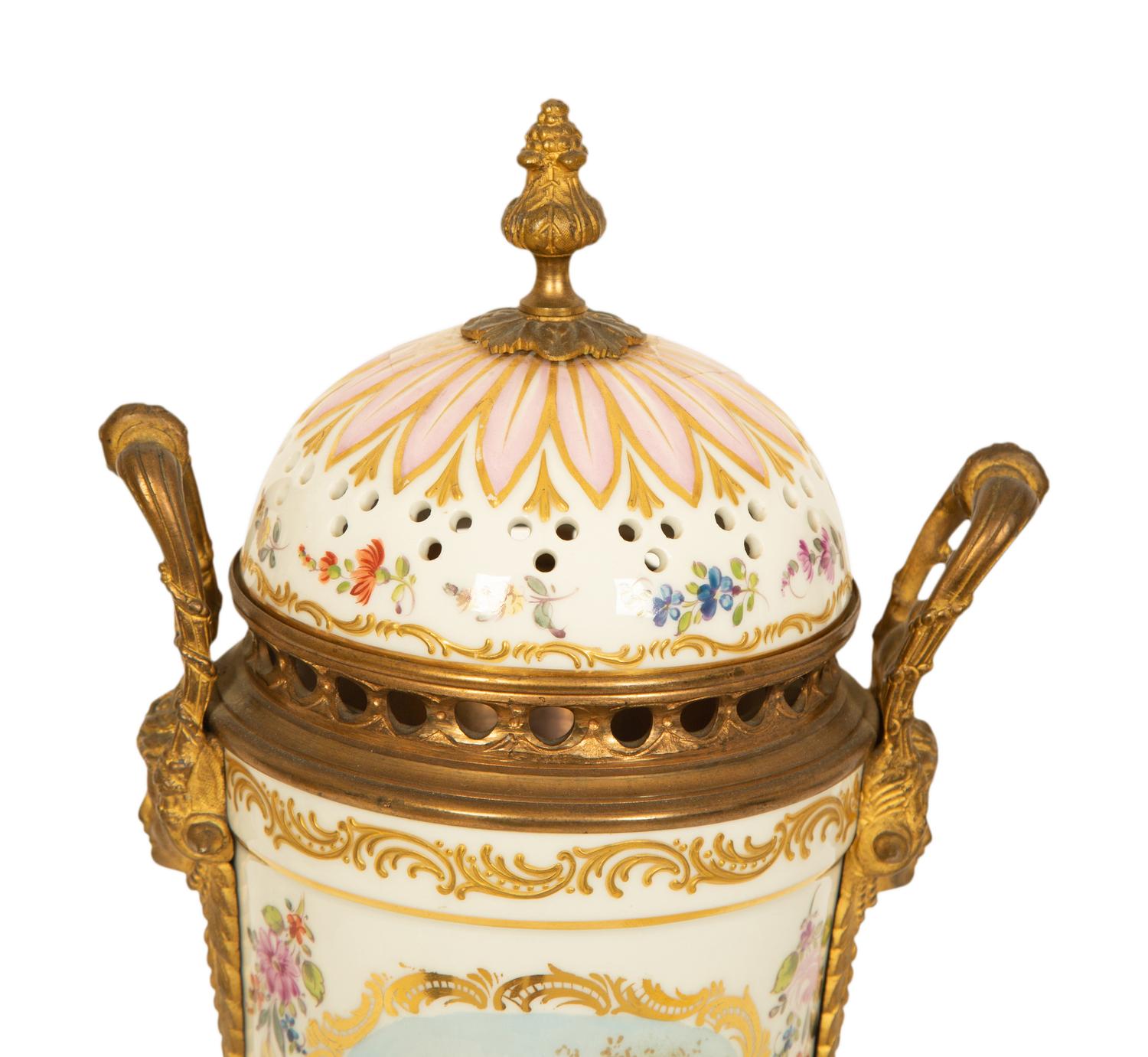 A Sevres Style Gilt Metal Mounted Porcelain Urn