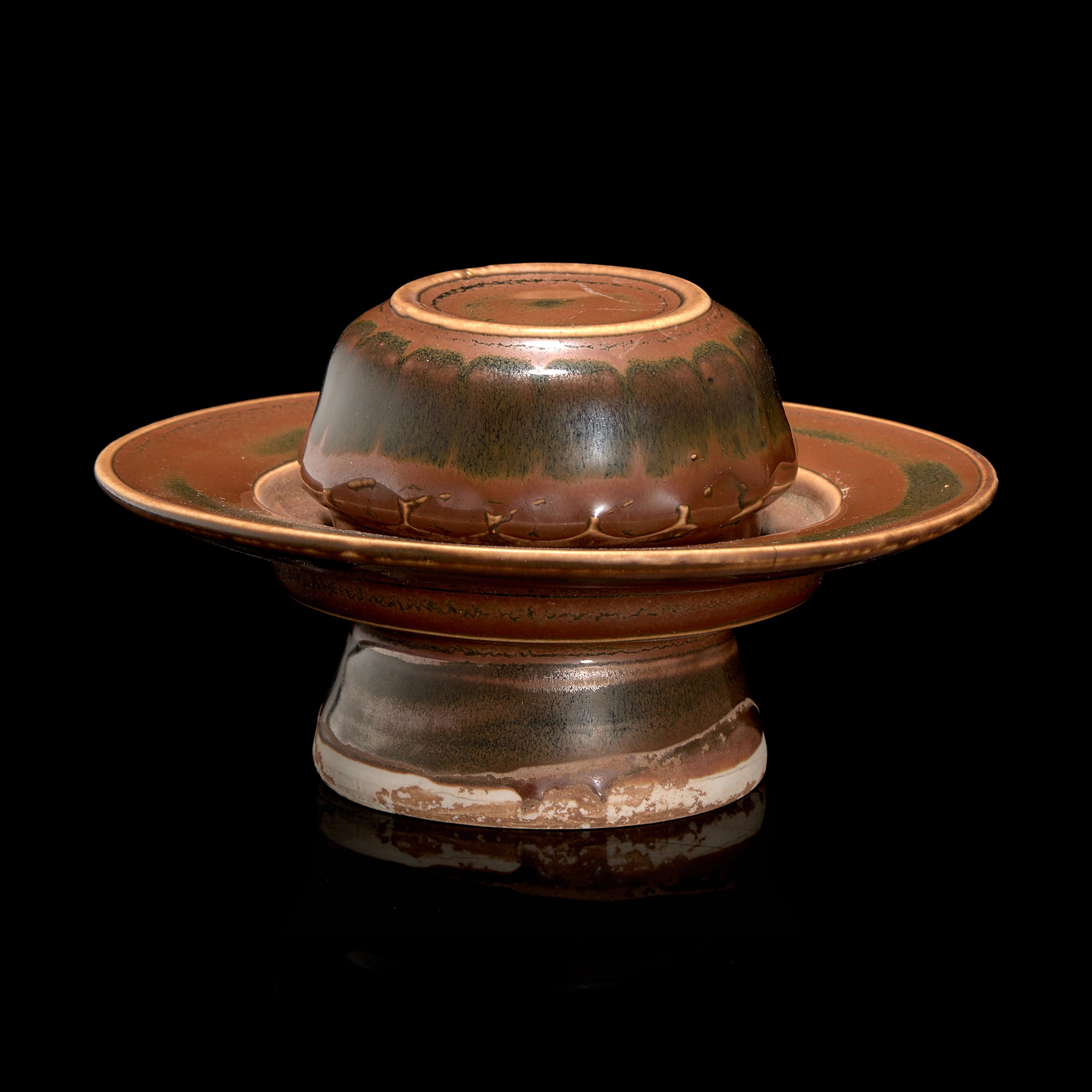 A Chinese Persimmon Glazed Porcelain Cup Stand — 紫金釉盞托