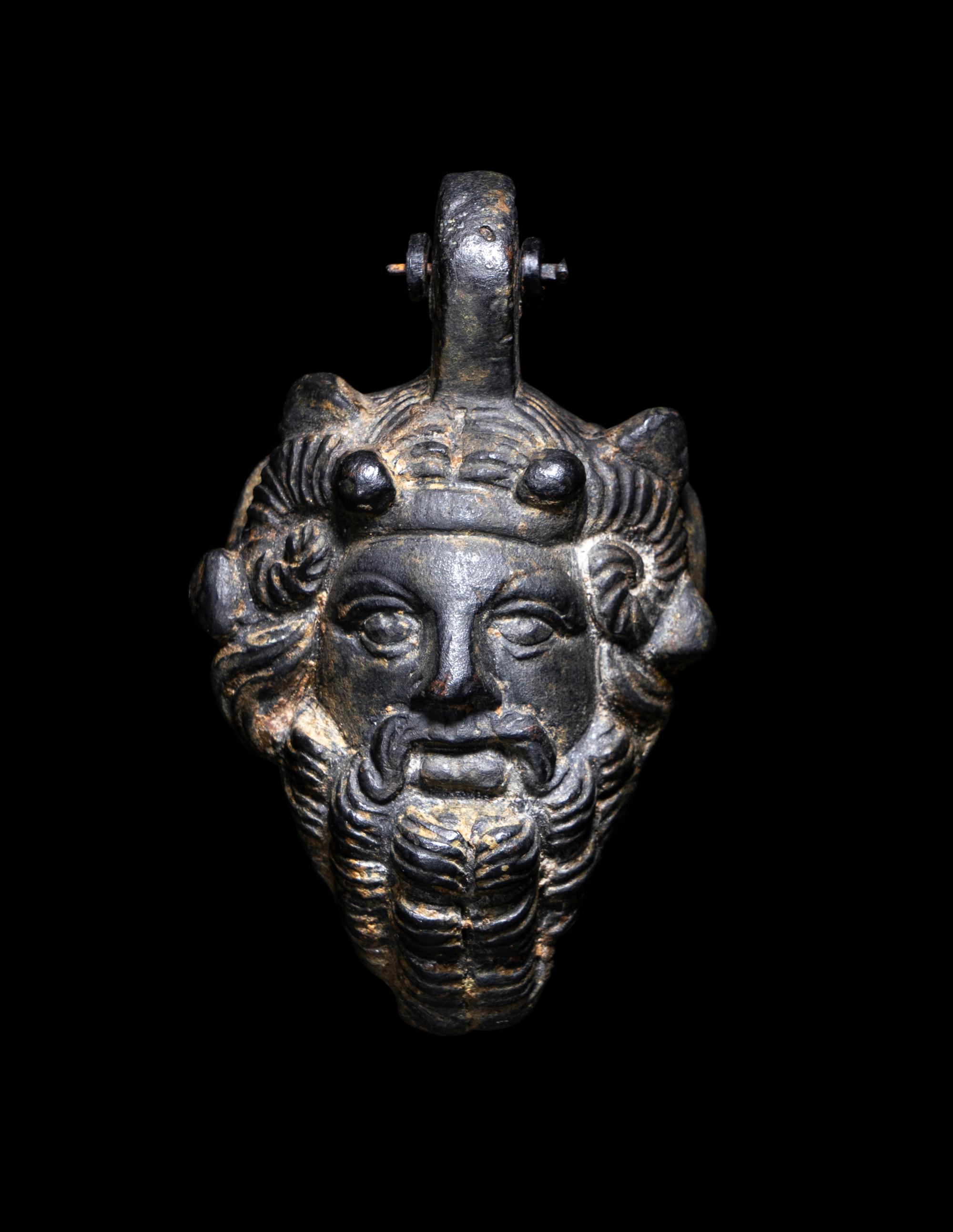 A Roman Bronze Zeus-Ammon Applique