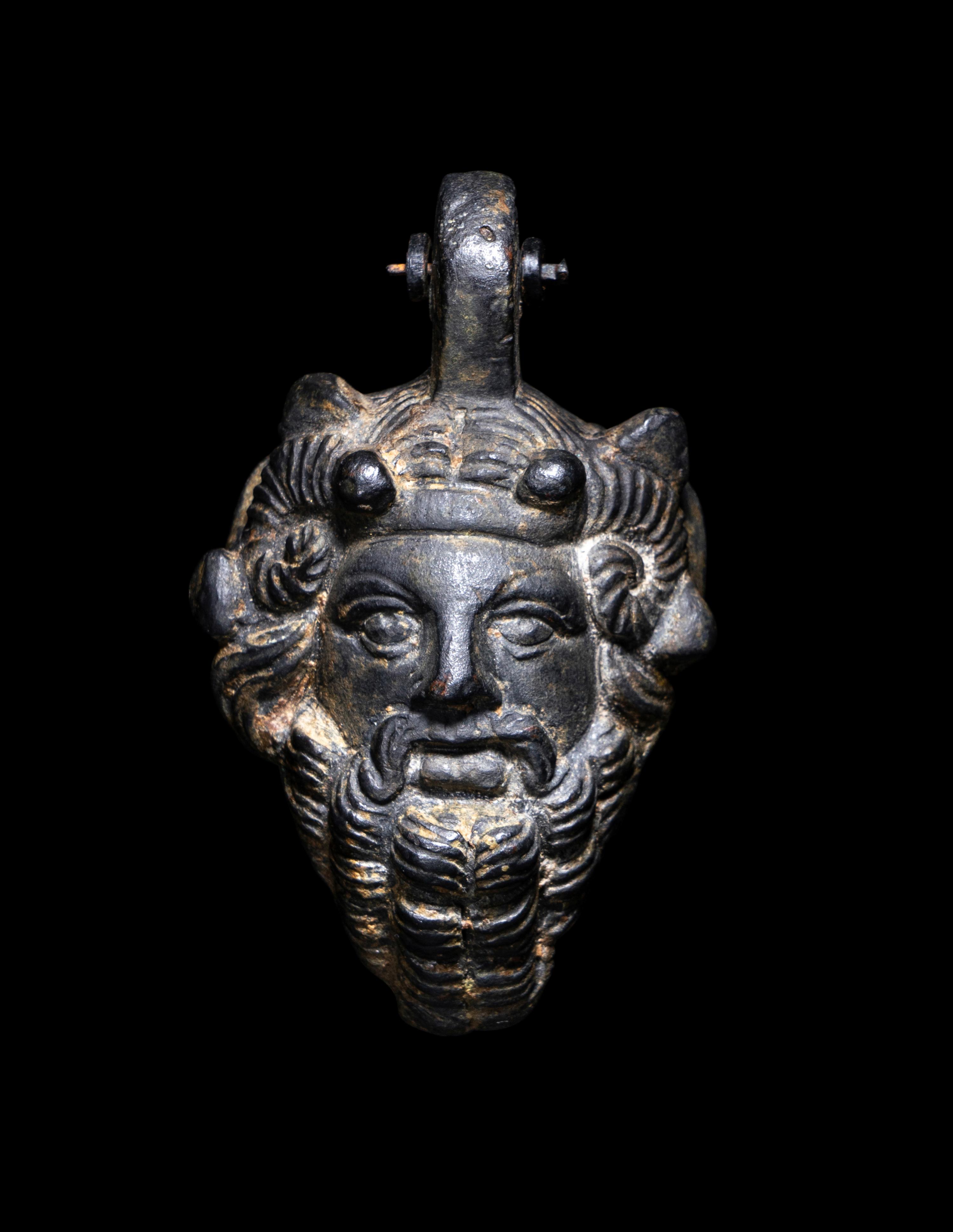 A Roman Bronze Zeus-Ammon Applique
