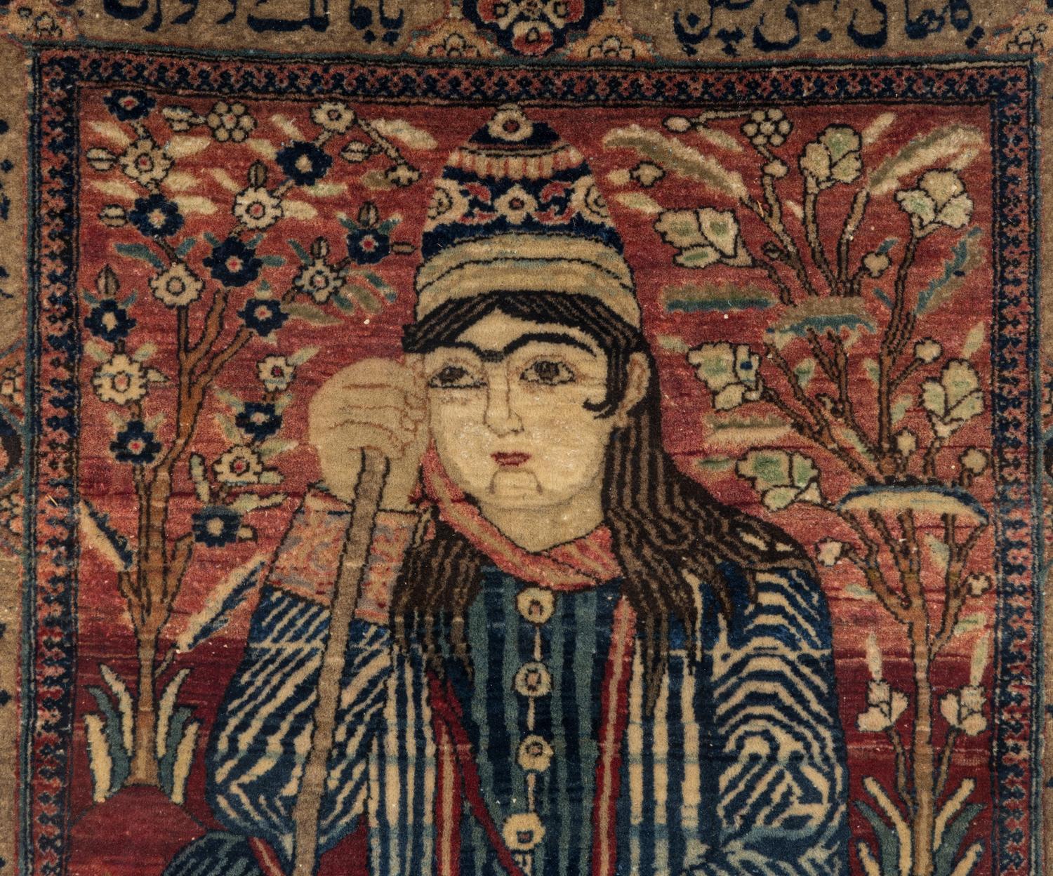 A Persian Pictorial Wool Rug in a Giltwood Frame