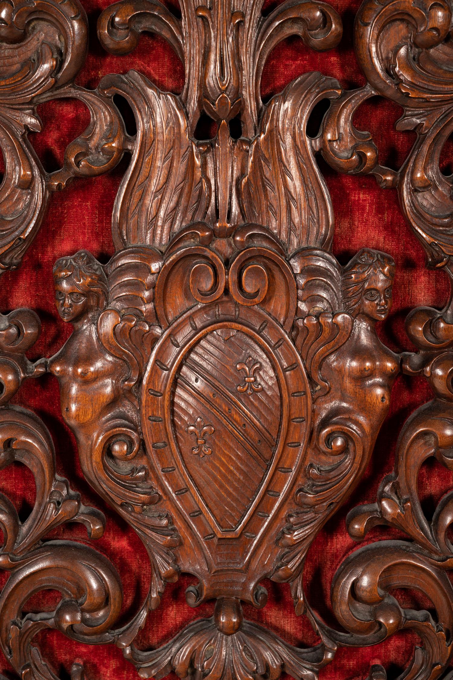 A Baroque Style Carved Walnut Three-Panel Floor Screen
