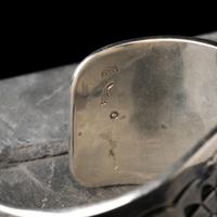 Victor Coochwytewa (Hopi, 1922-2011) — Silver Overlay Katsina and Pueblo Cuff Bracelet