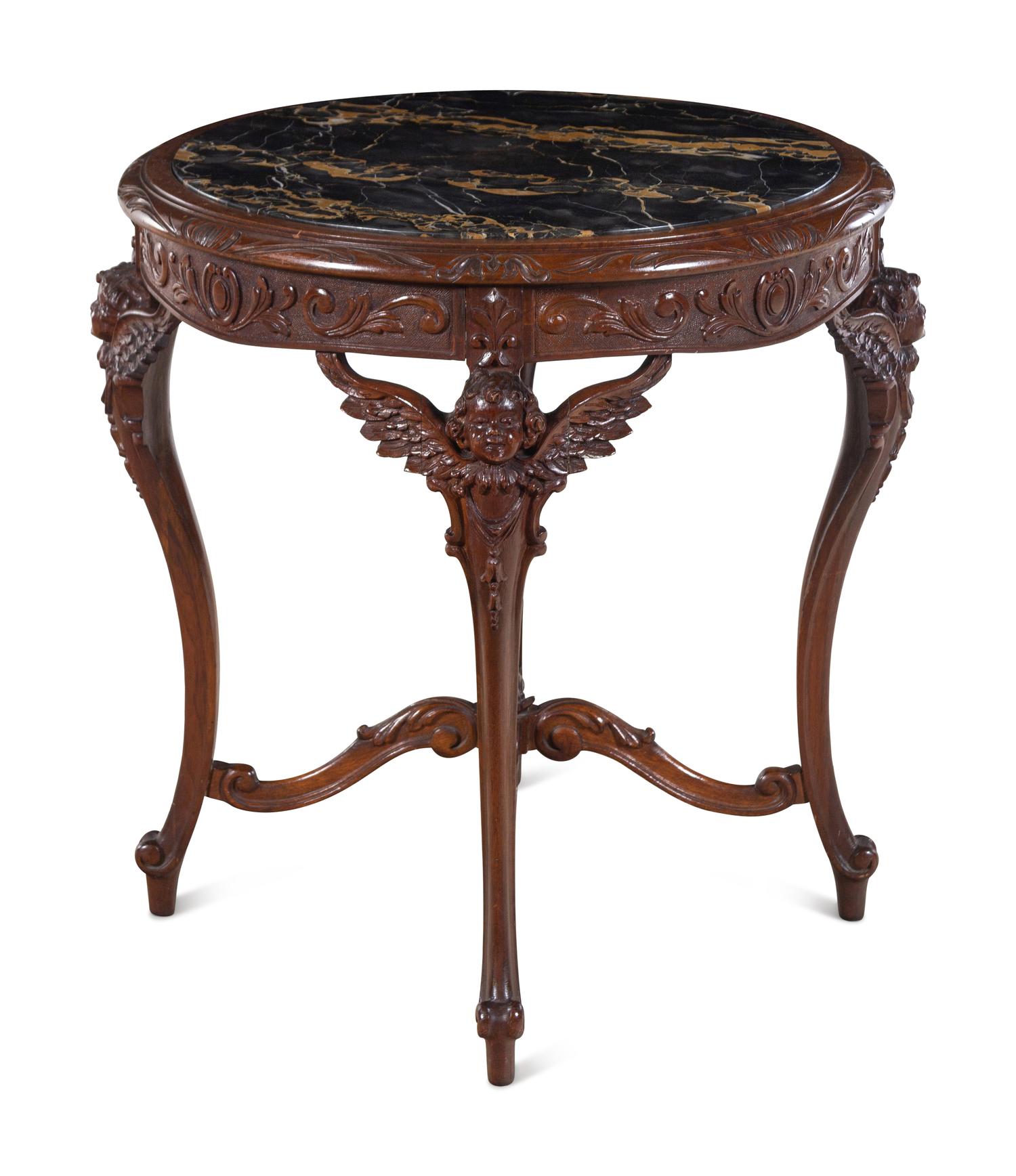 An Italian Carved Walnut Marble-Top Center Table
