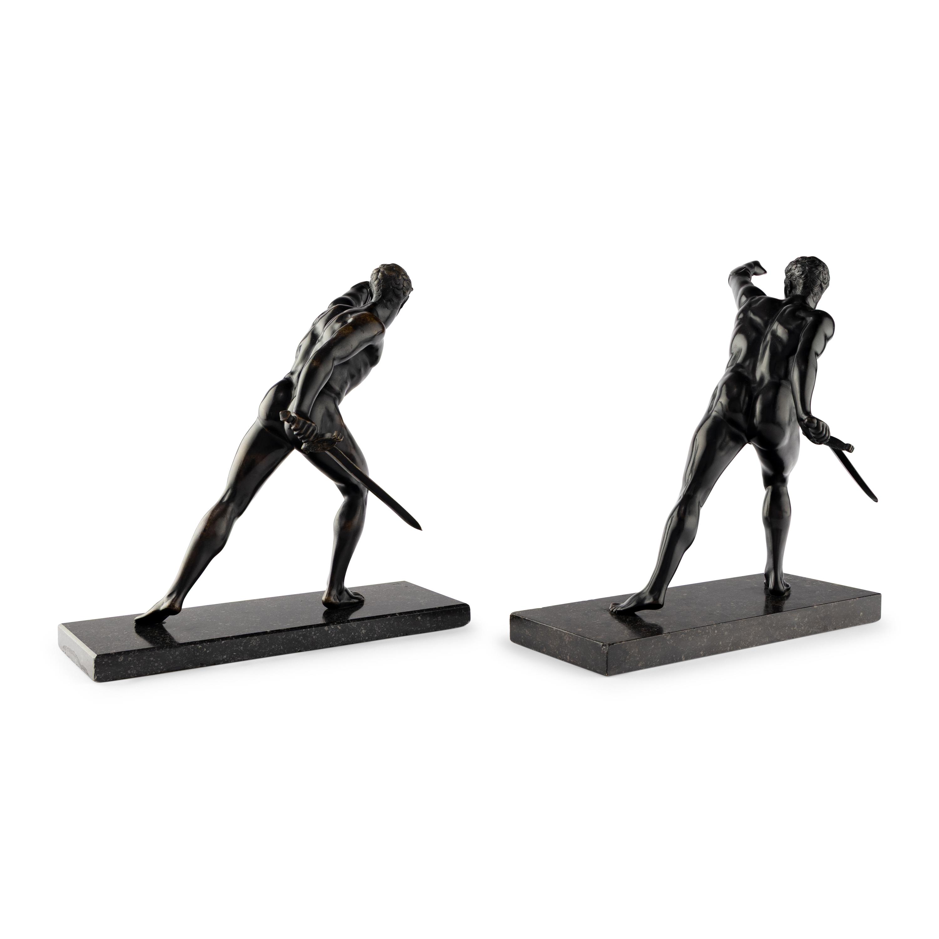 A Pair of Grand Tour Bronze Models of the Borghese Gladiator