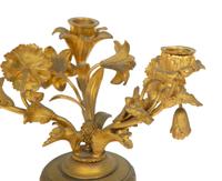 A Near Pair of French Gilt Bronze Floral Three-Light Candelabra