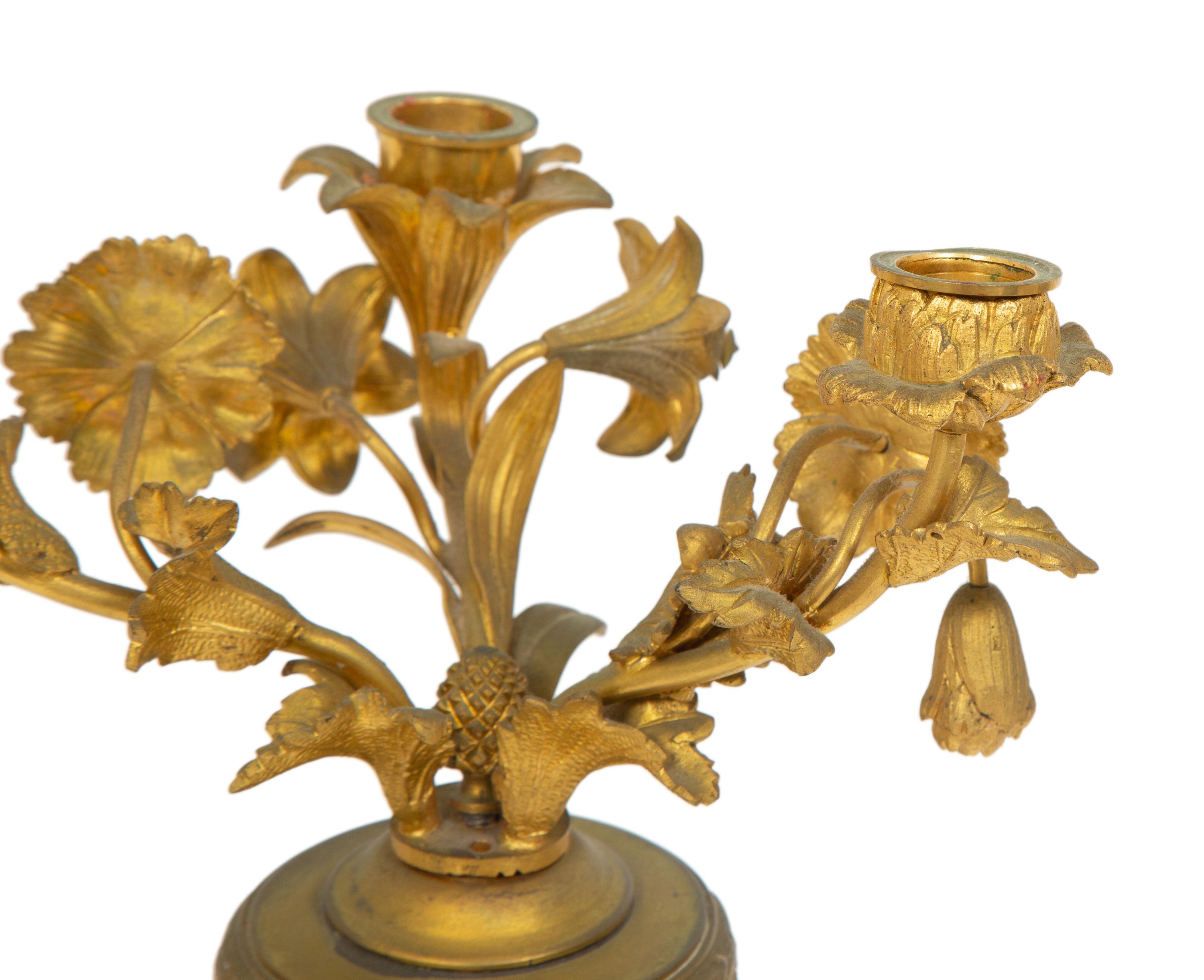 A Near Pair of French Gilt Bronze Floral Three-Light Candelabra