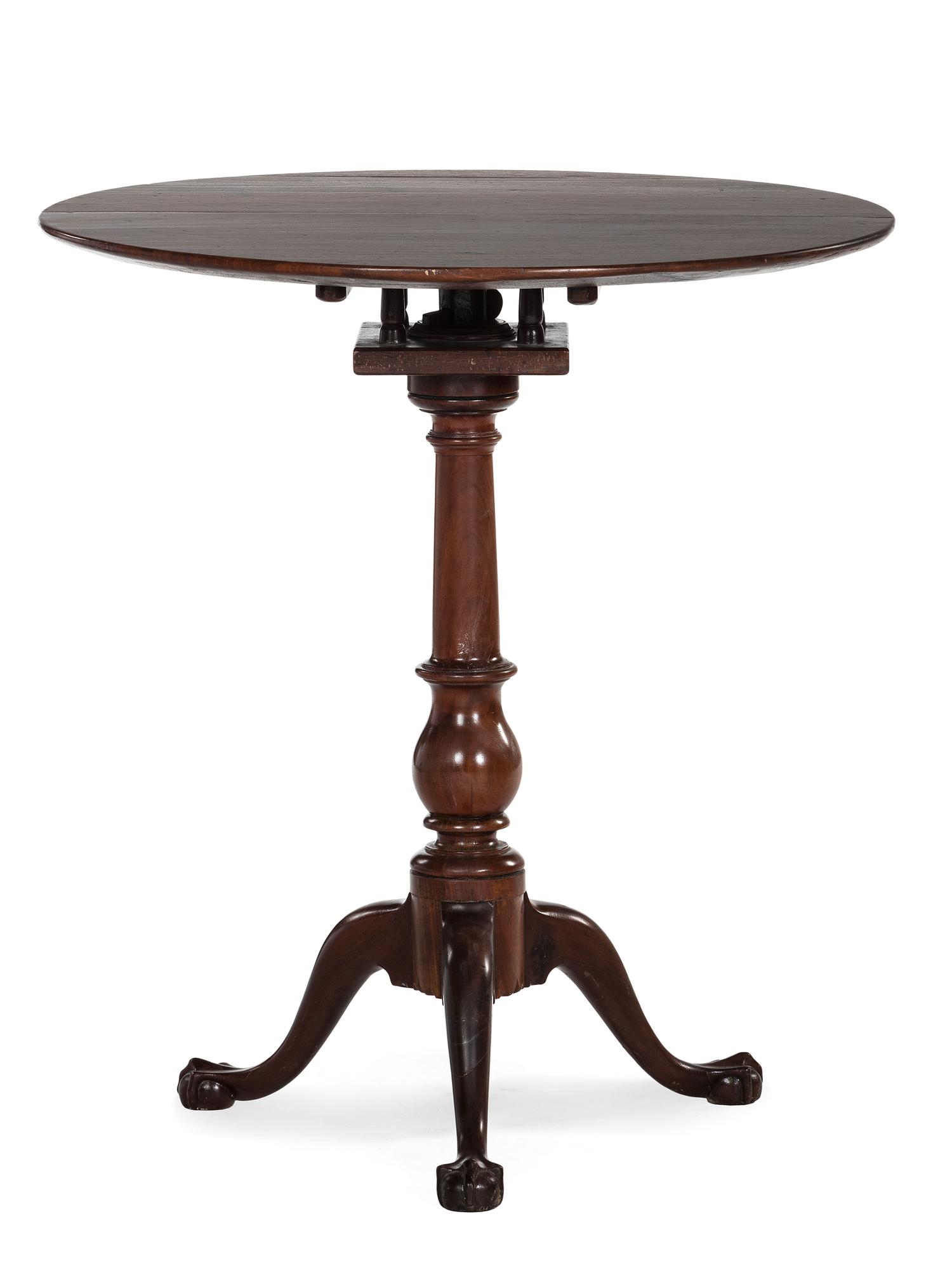 A Chippendale Walnut Claw and Ball Foot Tilt-Top Tea Table