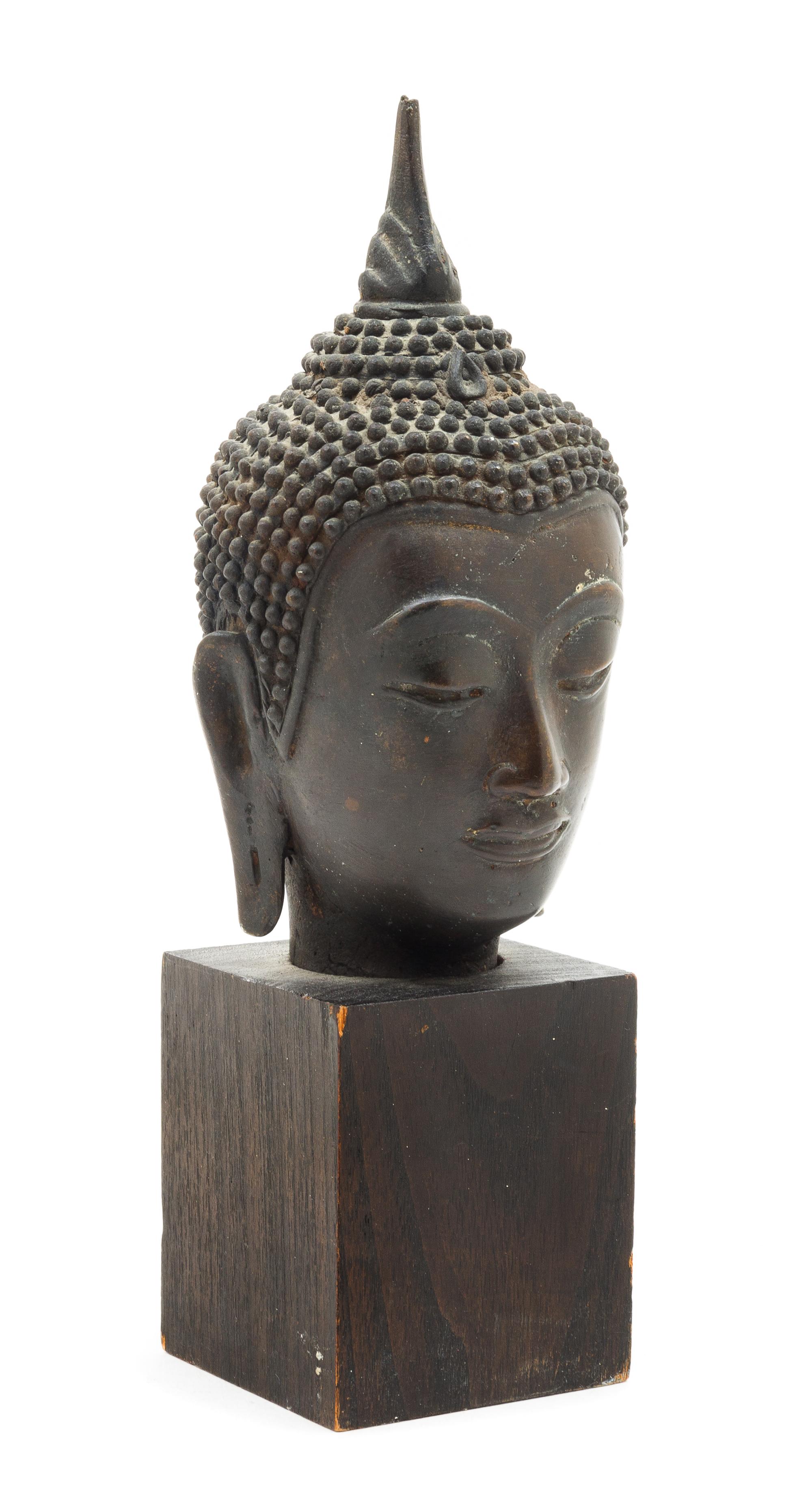 A Cambodian Bronze Head of Buddha Height 6 inches. — 19TH CENTURY