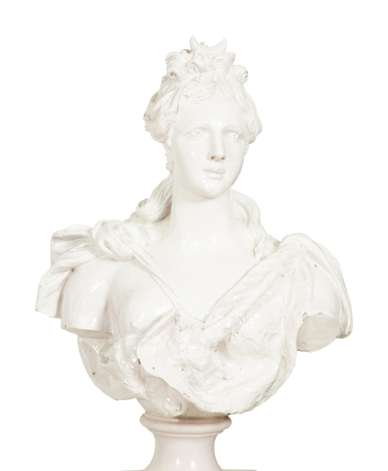 A Pair of Italian White Glazed Ceramic Busts on Pedestal Bases