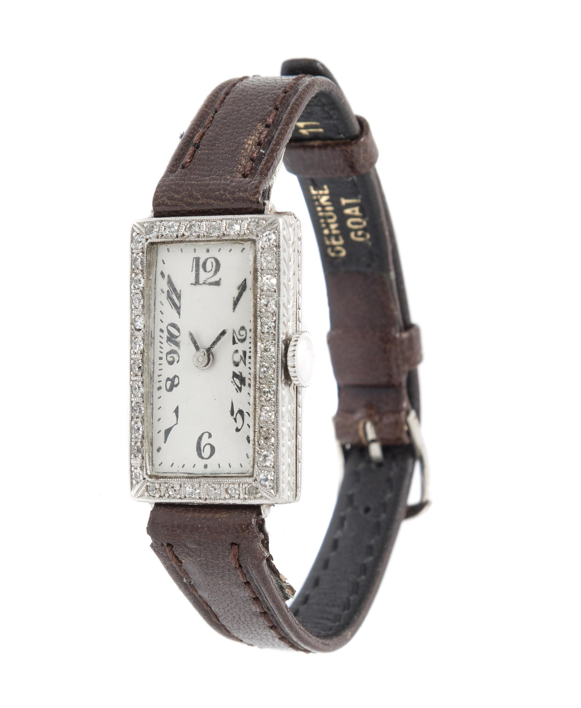 A Platinum and Diamond Wristwatch,
