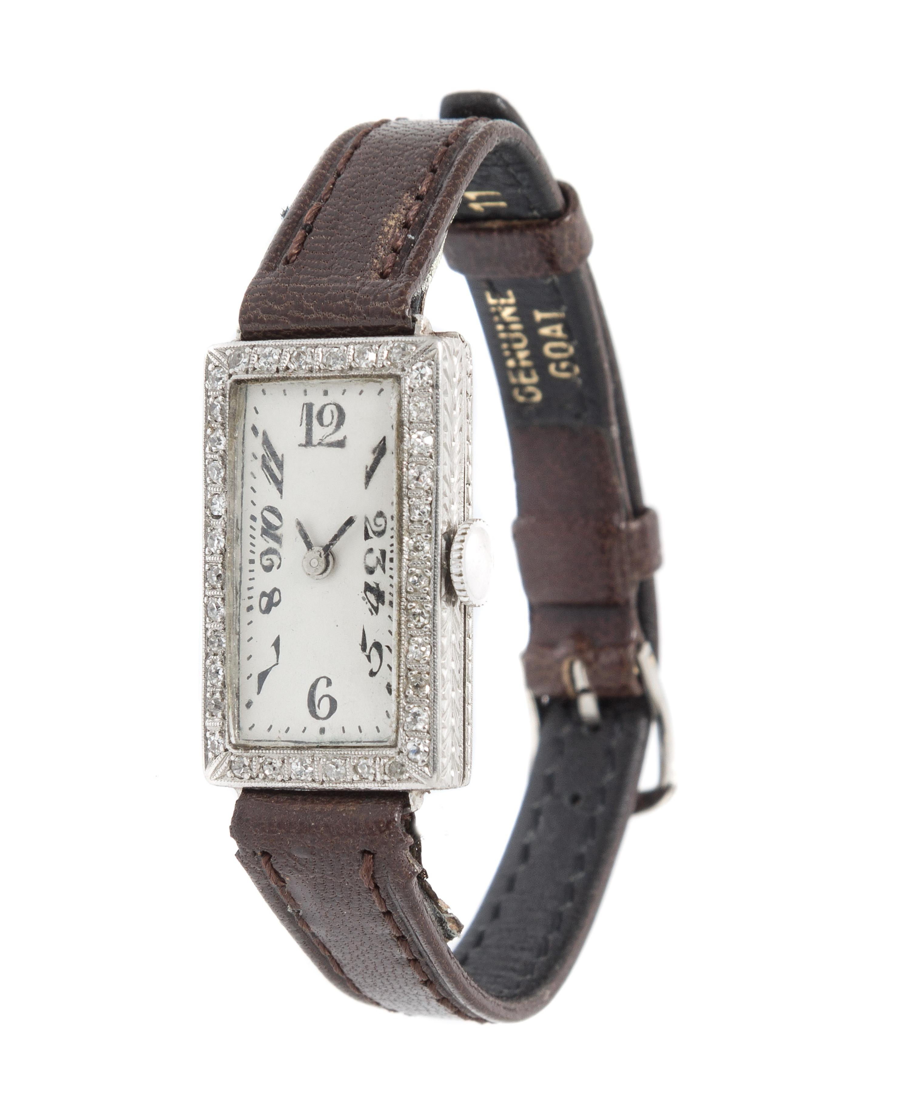 A Platinum and Diamond Wristwatch,