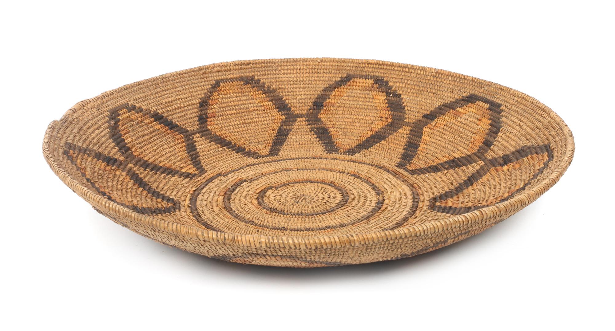 A Mission Indian Basket Tray Height 2 7/8 x diameter 16 7/8 inches.