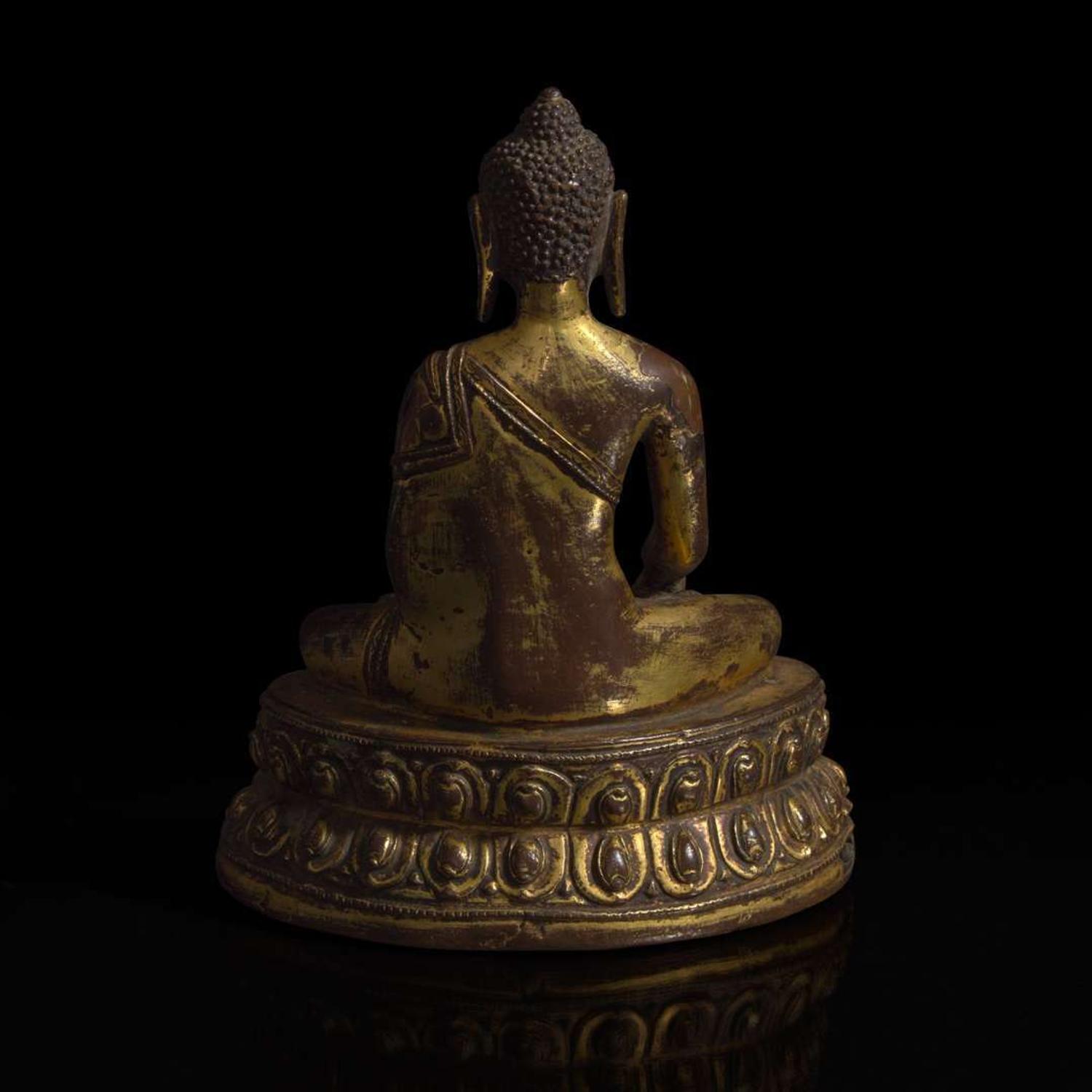A Himalayan gilt copper alloy figure of Buddha Akshobhya 喜马拉雅铜鎏金阿閦佛造像 14th Century or earlier ???????