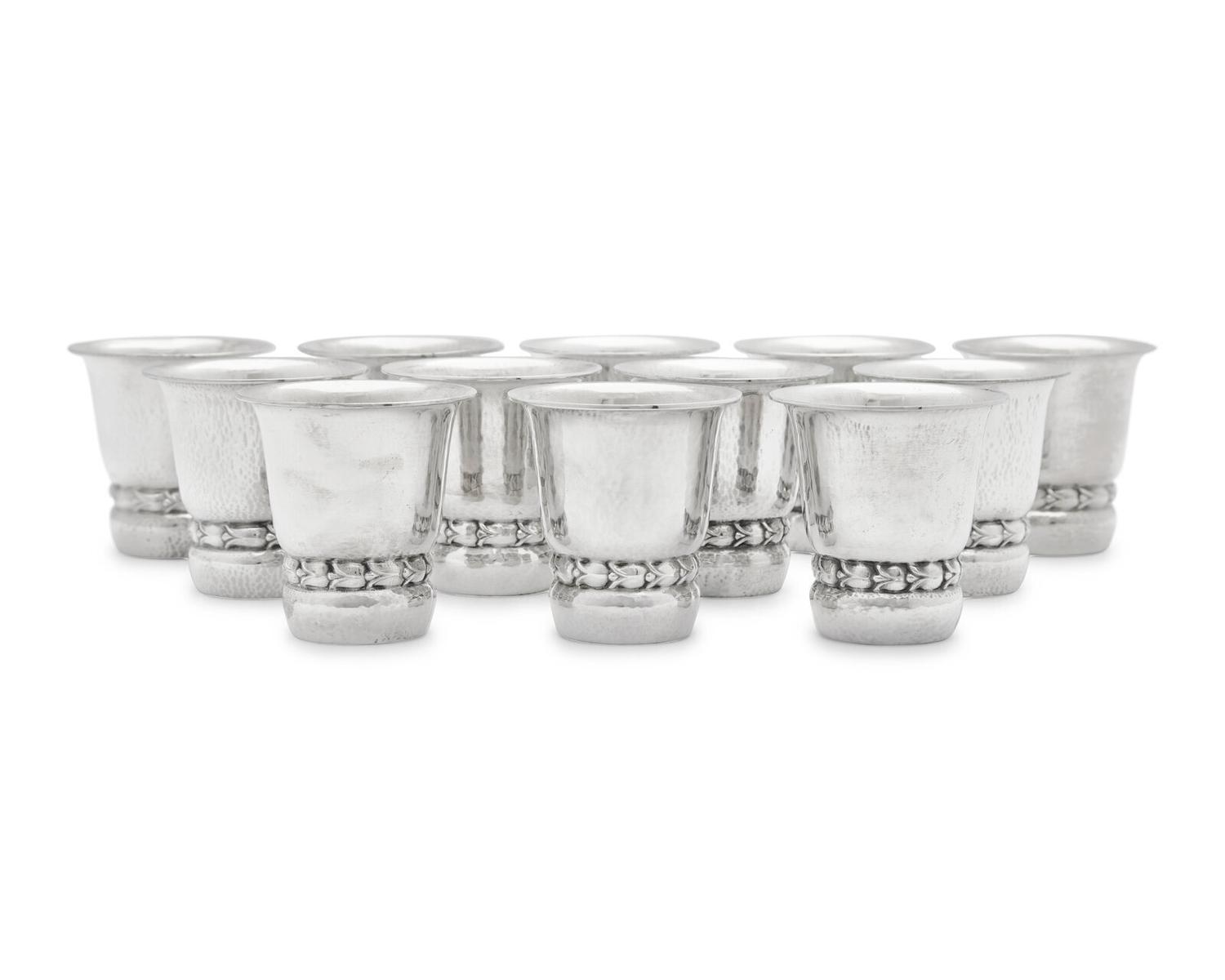 A Set of Twelve Georg Jensen Silver Beakers