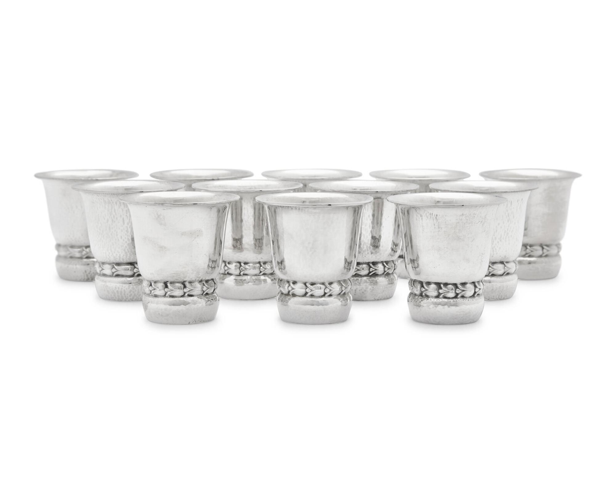 A Set of Twelve Georg Jensen Silver Beakers