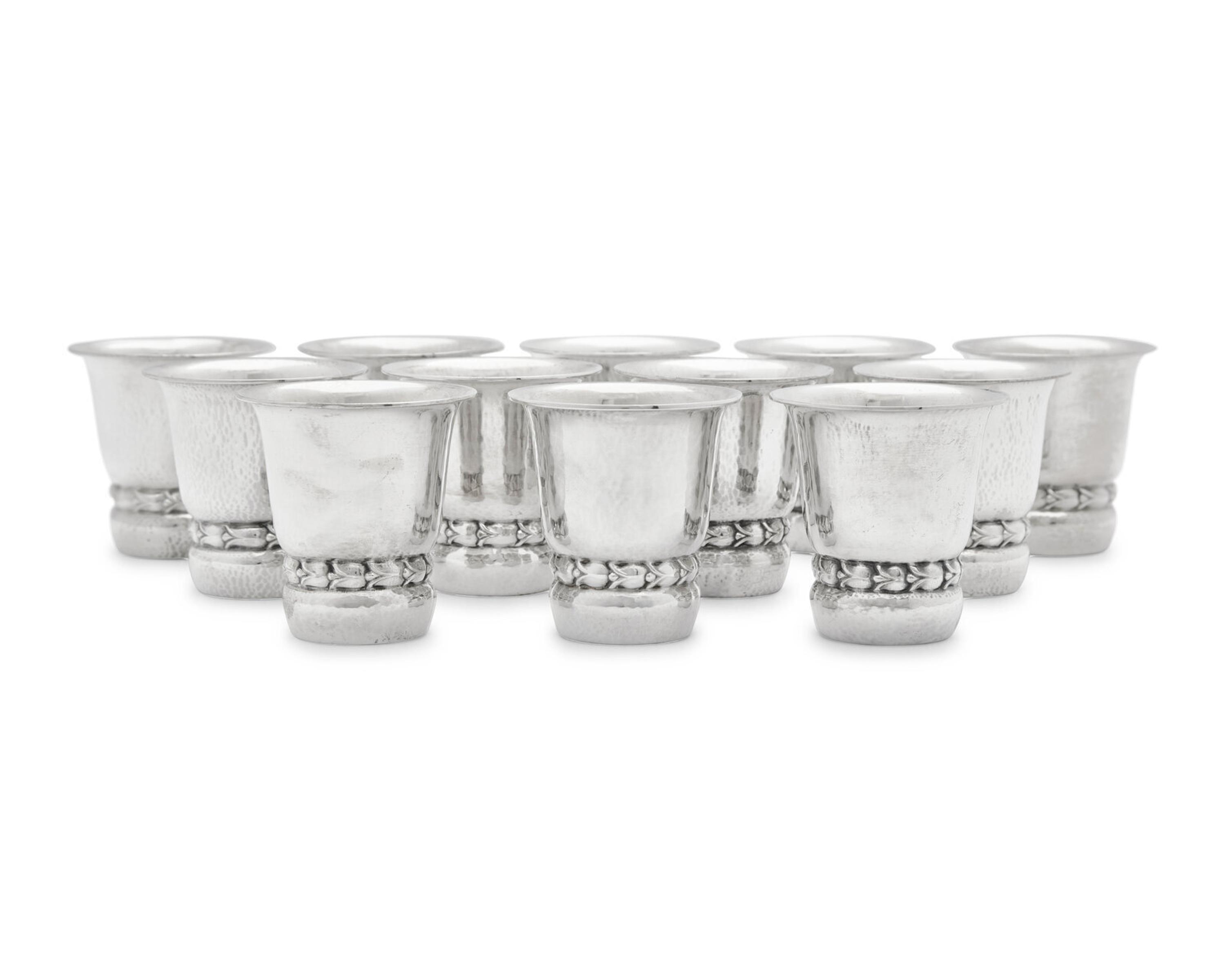 A Set of Twelve Georg Jensen Silver Beakers