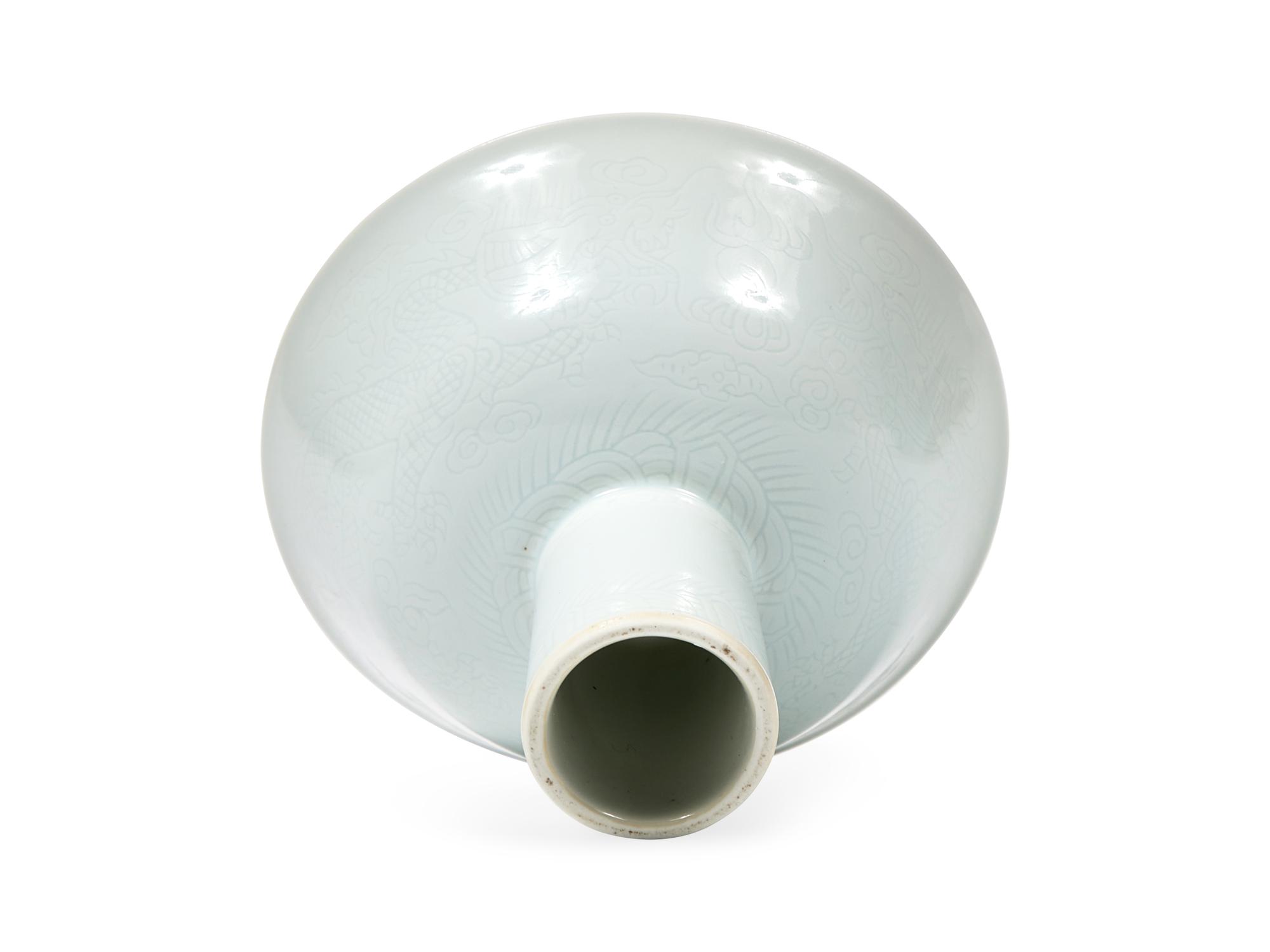A Chinese Incised Porcelain "Dragon" Stem Cup 龍紋高足杯