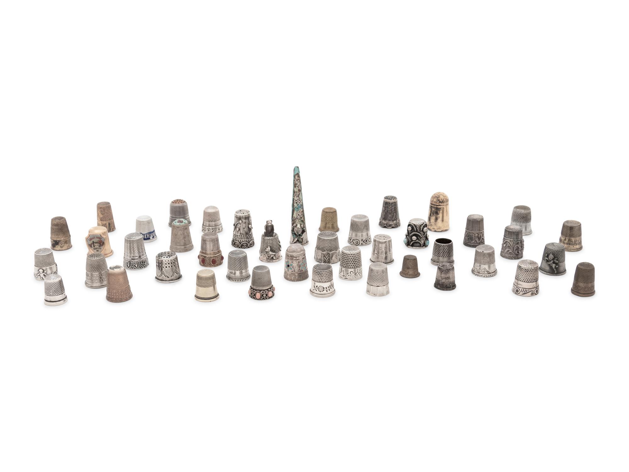 A Collection of Silver, Silver-Plate and Brass Thimbles