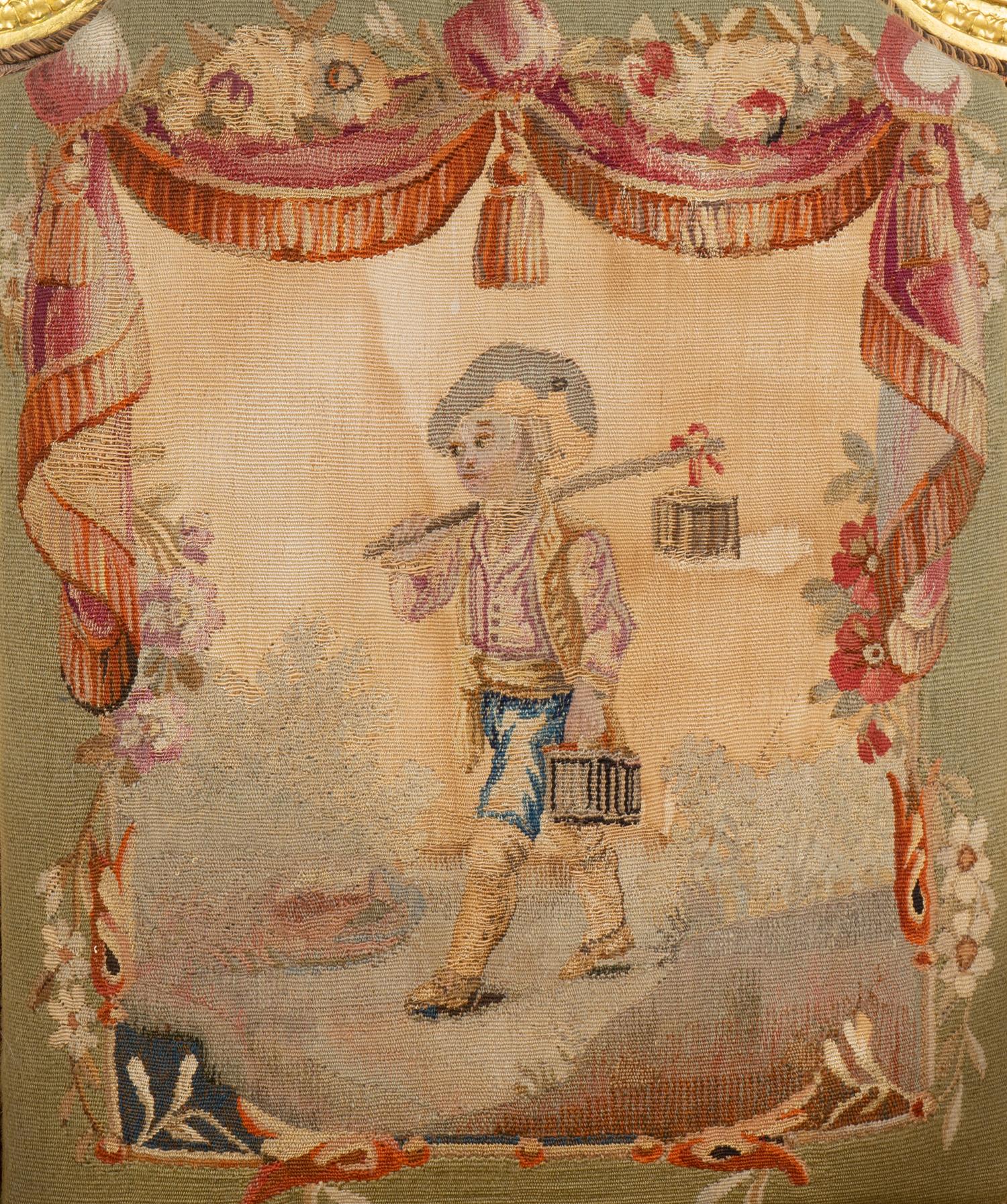 A Set of Four Louis XVI Style Giltwood Fauteuils with Tapestry Upholstery — 19TH CENTURY