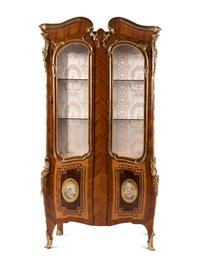 A Pair of Louis XV Style Gilt Bronze Mounted Tulipwood Vitrine Cabinets