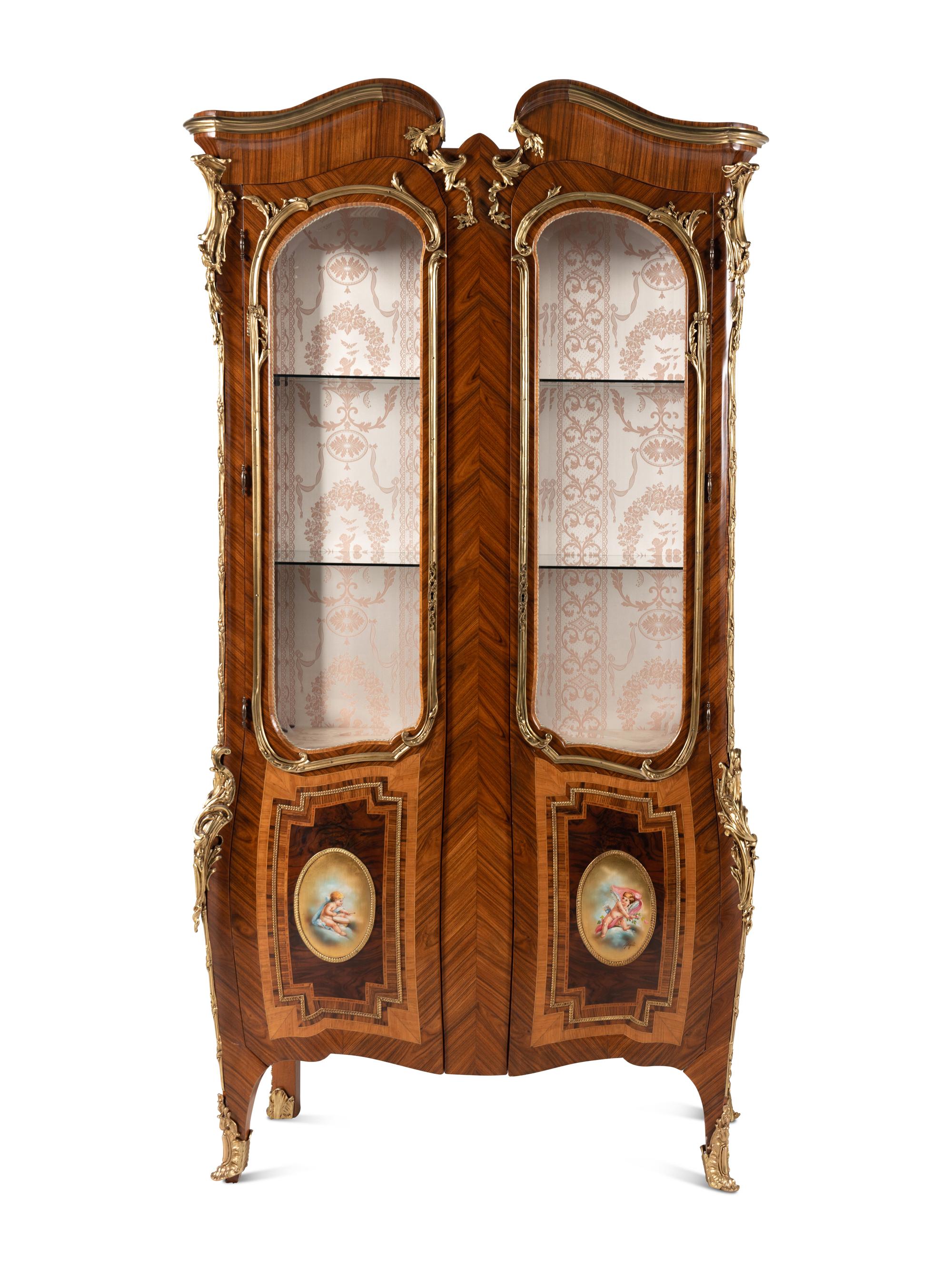 A Pair of Louis XV Style Gilt Bronze Mounted Tulipwood Vitrine Cabinets