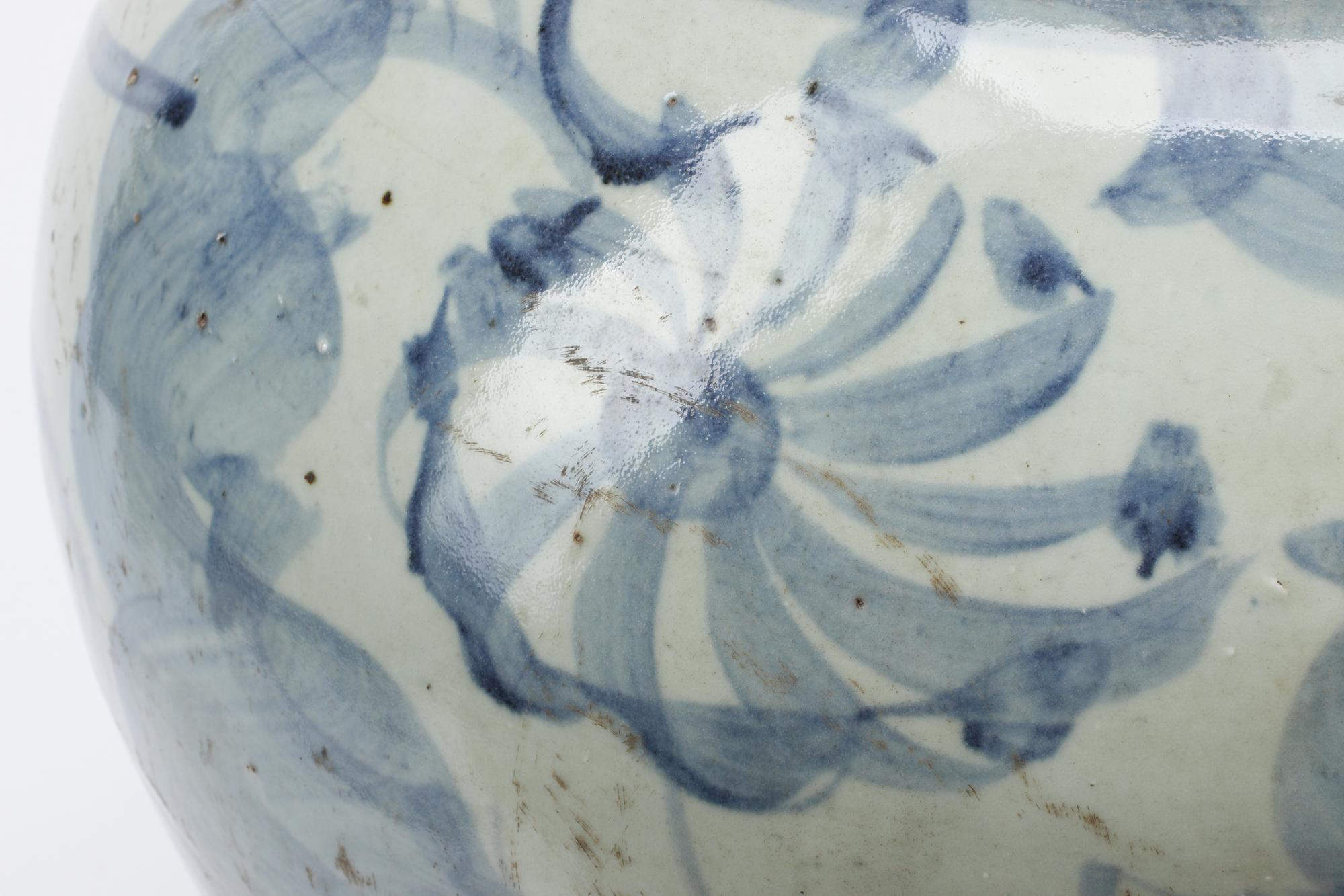 A Korean Iron-Mounted Porcelain Tea Jar