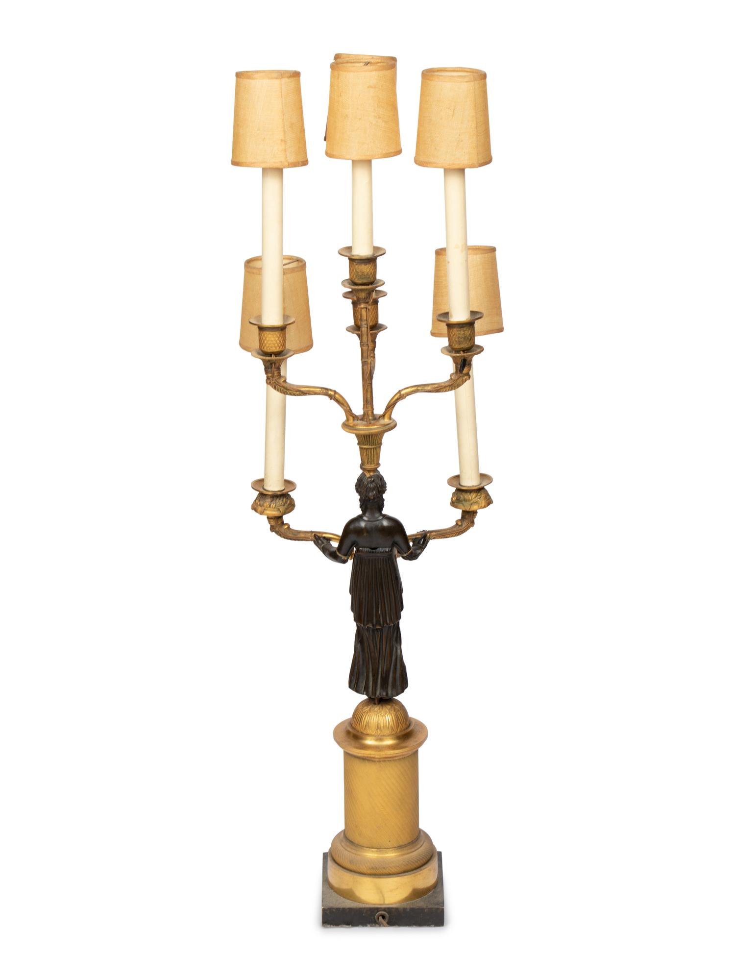 An Empire Style Gilt and Patinated Bronze Figural Six-Light Candelabrum Mounted as a Lamp